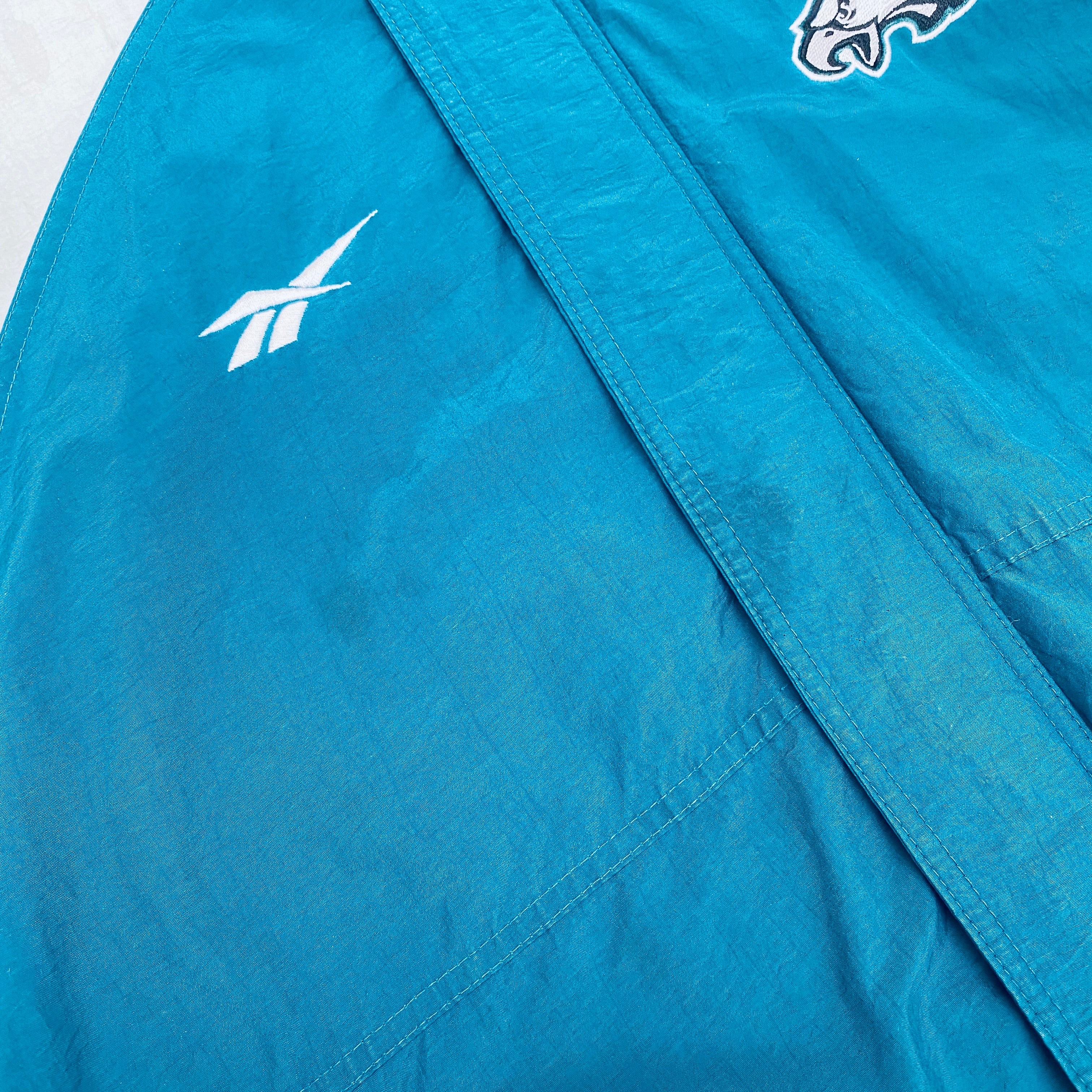Philadelphia Eagles 1990s Reebok Reverse Spellout Full-Zip Proline Jacket for Men - Vintage NFL Football Fan Gear for Game Day & Casual Wear