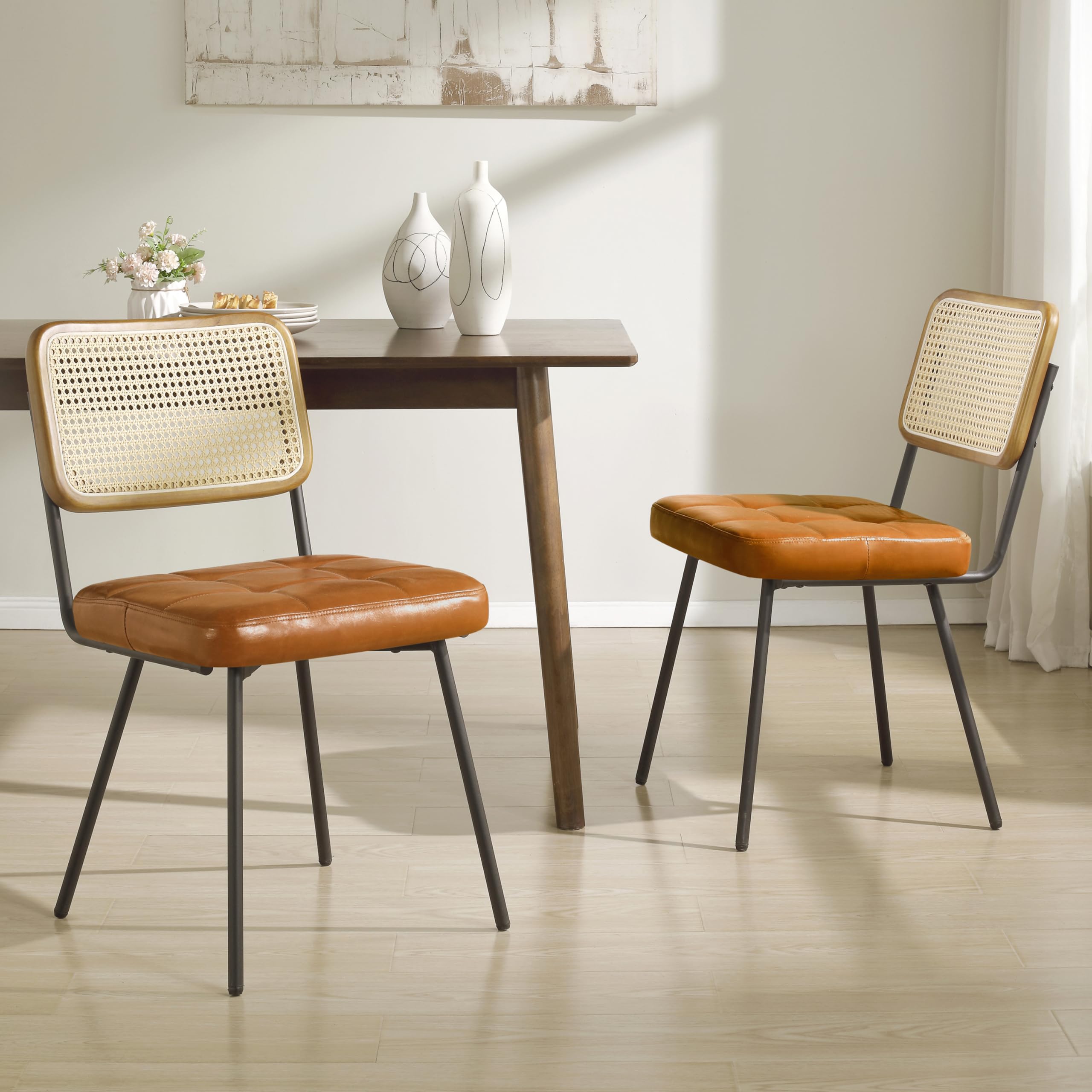 Art Leon Rattan Dining Chairs Set of 2 - Mid Century Modern Kitchen & Dining Room Chairs with Woven Rattan Back, Faux Leather Seat & Black Metal Legs - Sturdy Rubber Wood Frame in Yellow Brown - Perfect for Breakfast Nook, Bistro, Patio & Small Space Dining