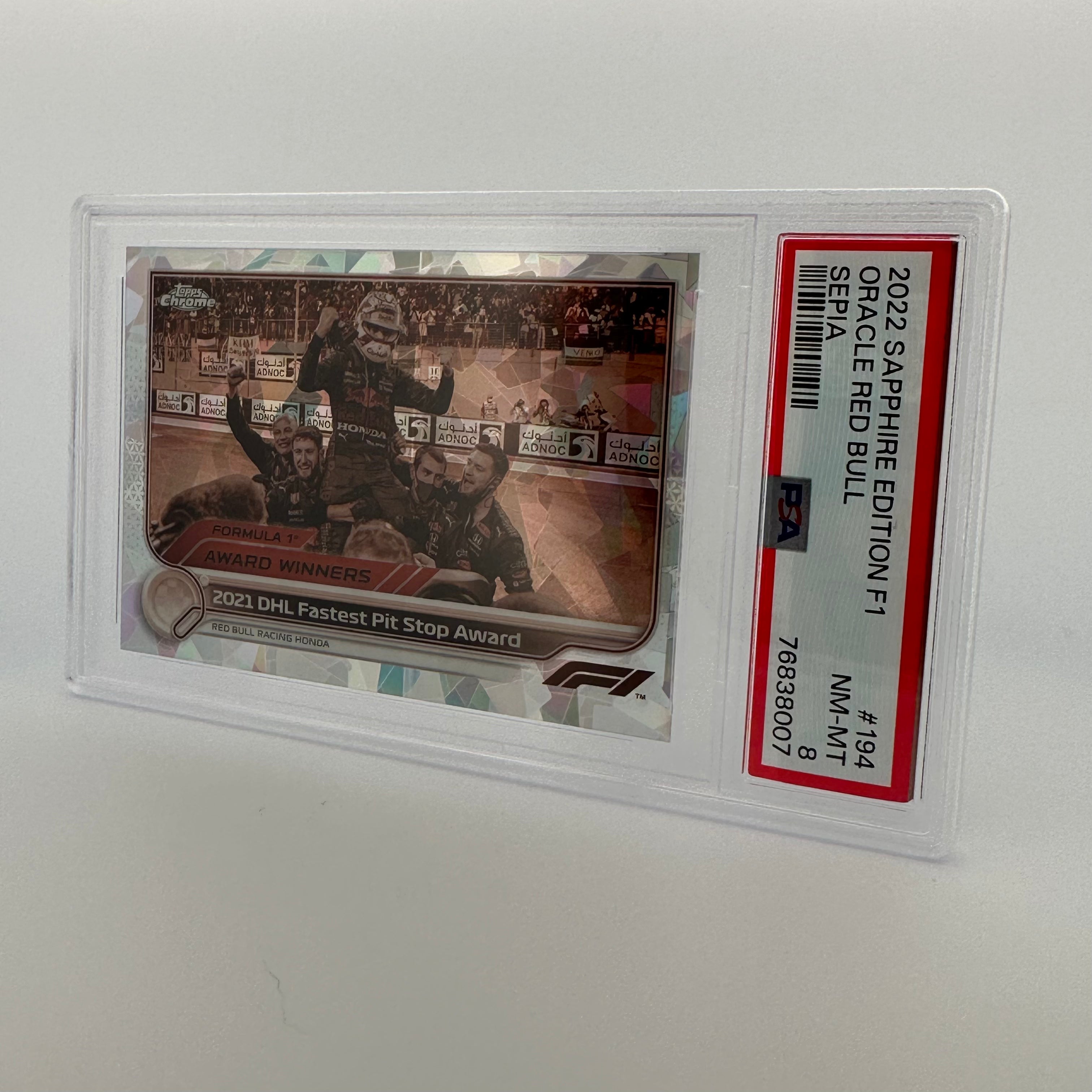 PSA 8 034/100 ORACLE RED BULL RACING #194 SAPPHIRE EDITION SEPIA - Limited Edition Collectible Racing Card for Fans & Memorabilia Enthusiasts - Perfect for Display, Trading, and Sports Memorabilia Collections
