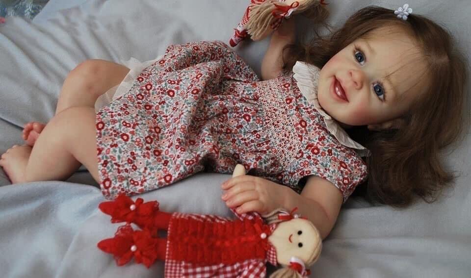Anano 24 Inch Lifelike Reborn Baby Doll - Realistic Silicone Toddler Doll with Vivid Veins, Wrinkles & Rooted Long Hair | Includes 2 Baby Teeth & Lovely Daisy Outfit | Perfect for Collectors, Gift Giving & Role Play Scenarios