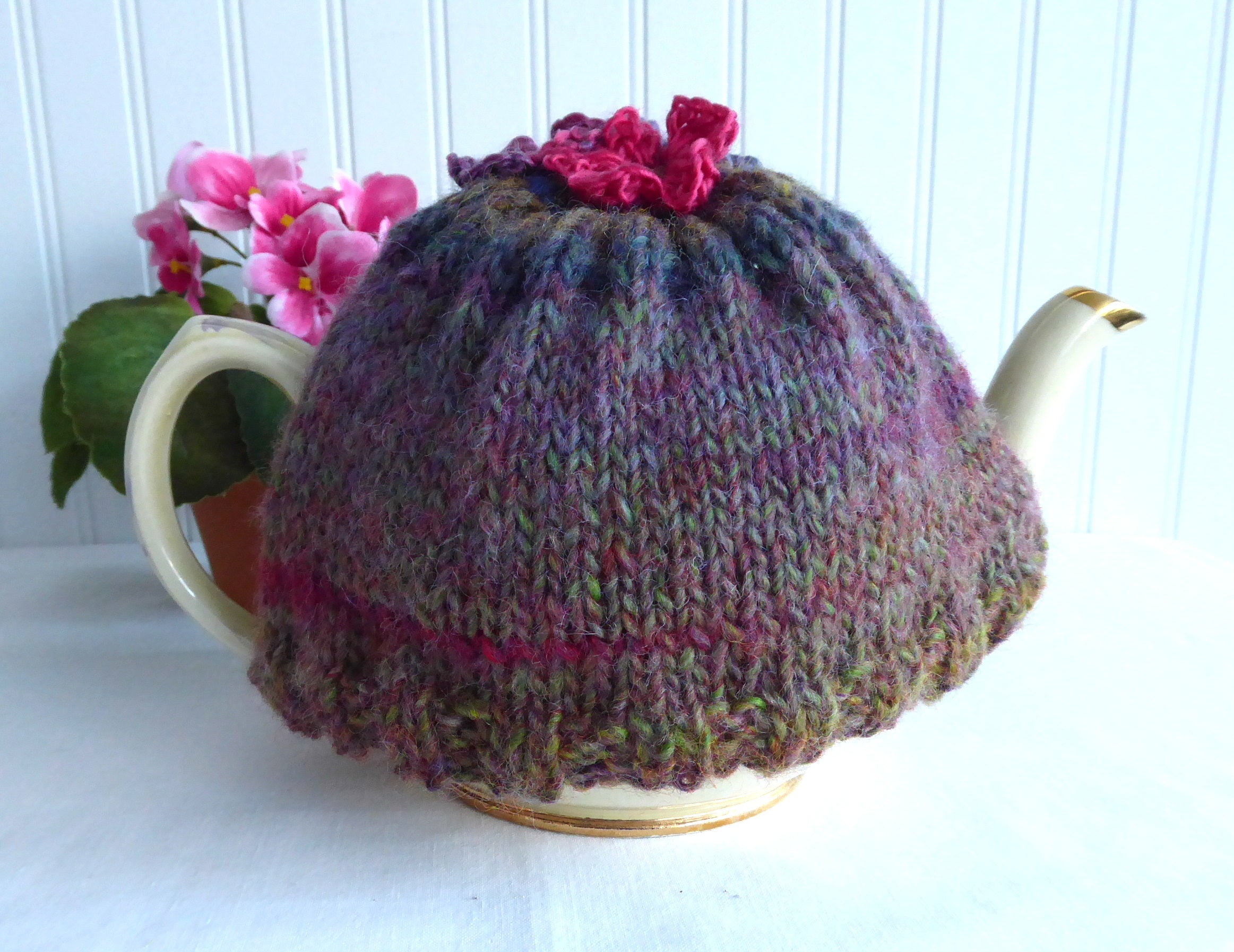 Hand Knit Tea Cozy with Floral Applique - Stretchy Brown & Green Variegated Knitted Tea Warmer for Teapots - Perfect for Afternoon Tea, Cozy Kitchen Decor & Gift Giving