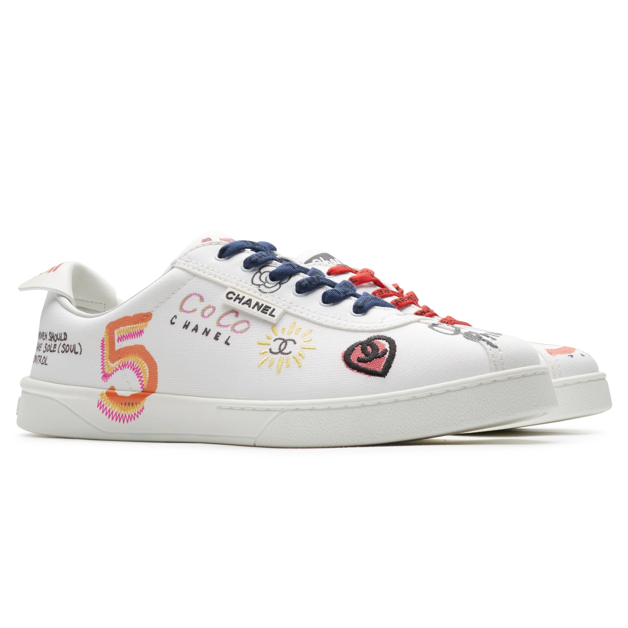 Chanel x Pharrell White Canvas Sneakers - Authentic Pre-Owned Luxury Shoes for Men | Streetwear Fashion, Casual Wear & Collector's Item