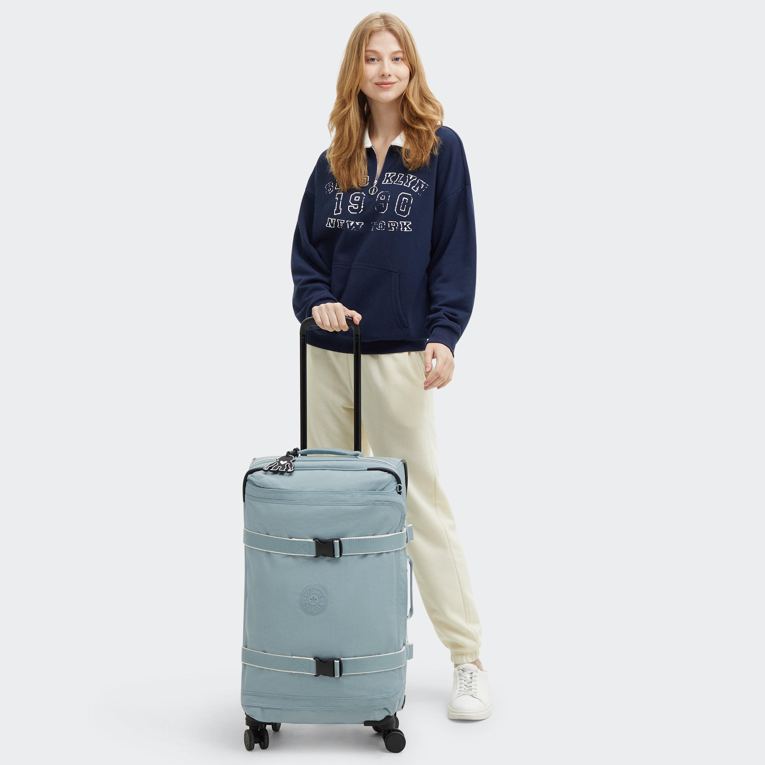 Kipling Spontaneous Medium Rolling Luggage - Lightweight Carry-On Suitcase with Spinner Wheels, Relaxed Grey | Perfect for Business Travel & Weekend Getaways