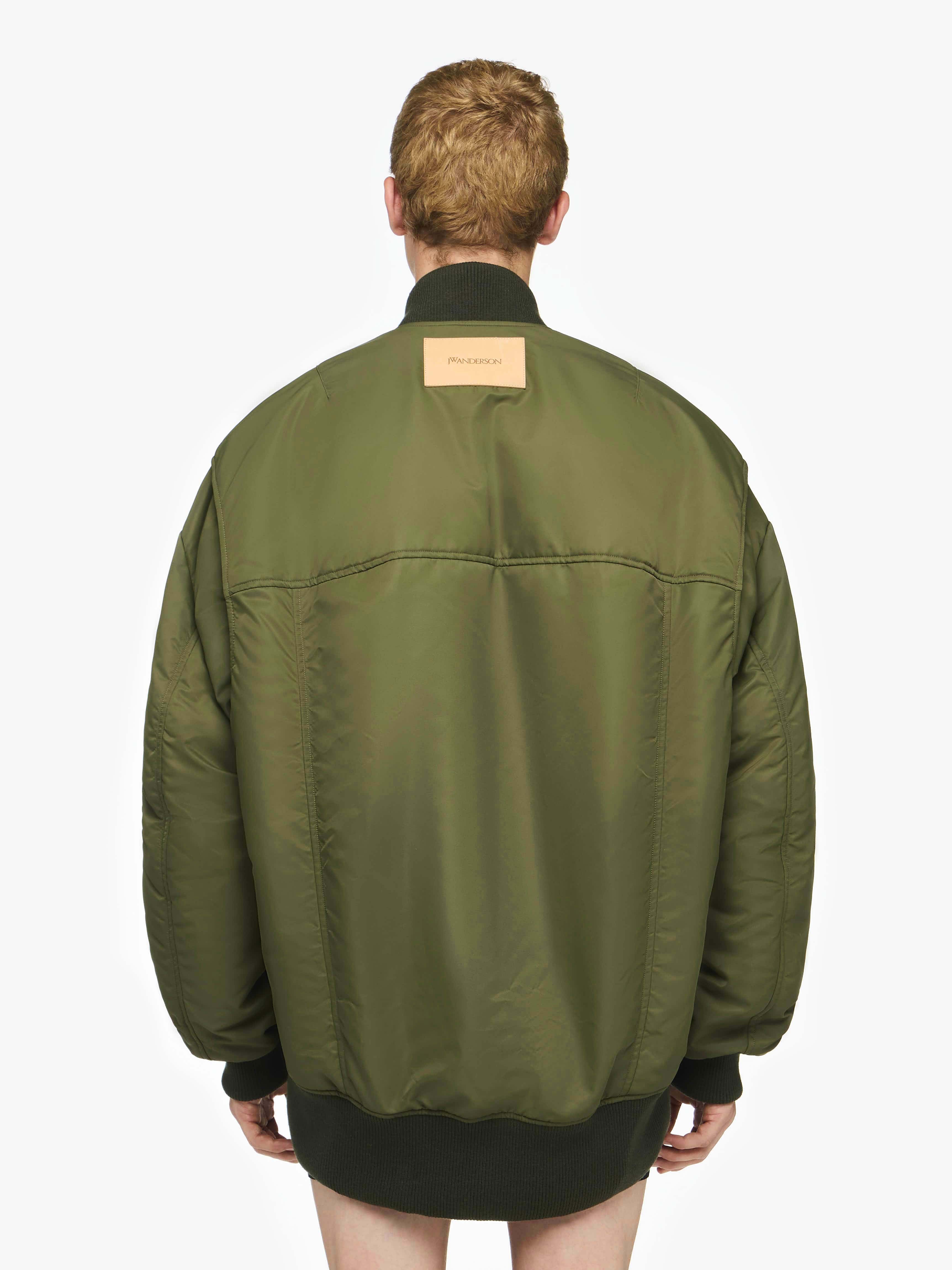Stylish Oversized Bomber Jacket with Curved Hem - Trendy Women's Outerwear for Casual Wear & Street Fashion