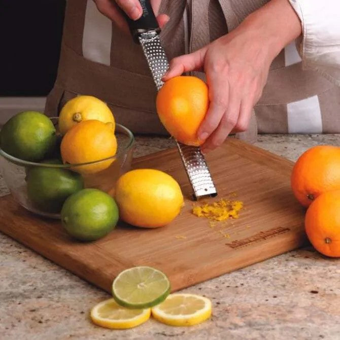 Microplane Premium Series Zester Grater - Ultra Sharp Stainless Steel Kitchen Tool for Zesting Citrus, Grating Cheese & Chocolate - Perfect for Baking, Cooking & Garnishing Dishes