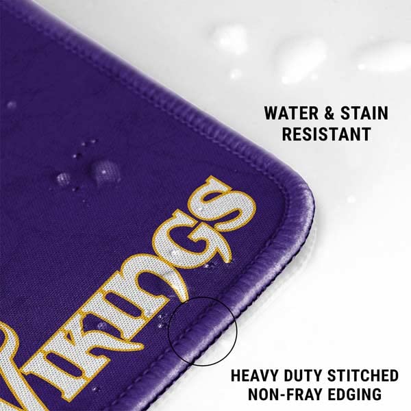 Skinit Extra Large Gaming Mouse Pad - Officially Licensed NFL Minnesota Vikings Distressed Design | Non-Slip Rubber Base & Stitched Edges | Waterproof Desk Mat for Keyboard & Mouse | Perfect for Gaming, Office & Home Workspace