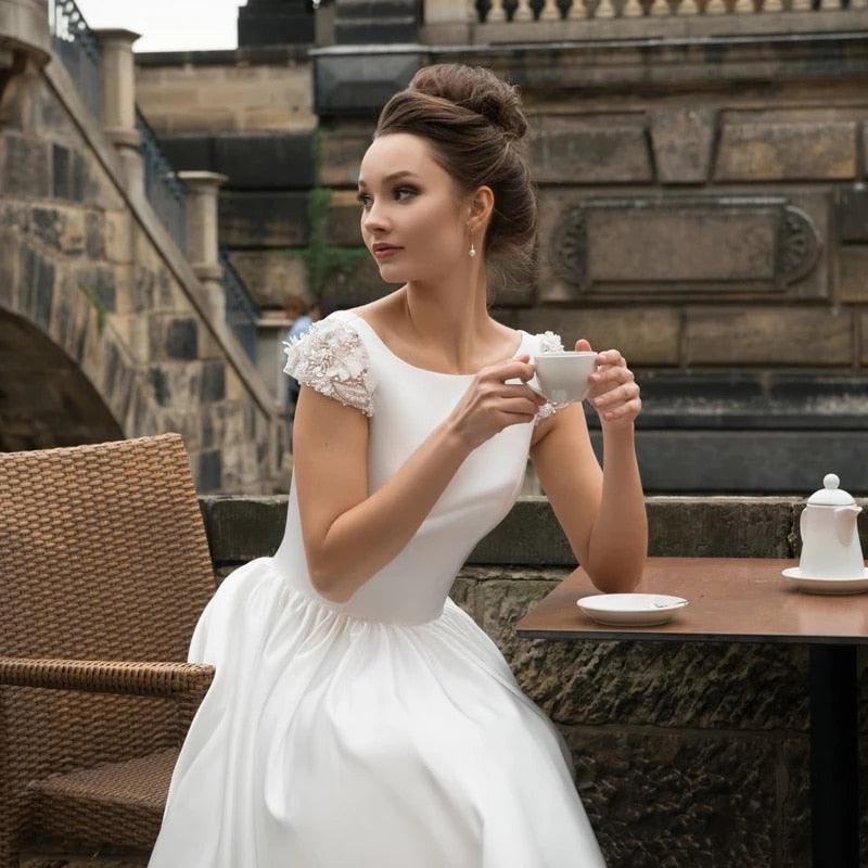 Elegant Cap Sleeve Backless Wedding Dress - Simple & Classic Short Sleeve Bridal Gown for Beach, Garden or Outdoor Ceremonies