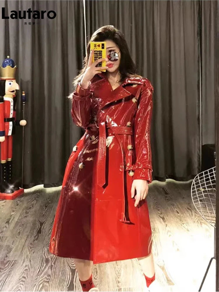 Women's Autumn Long Shiny Reflective Patent Faux Leather Trench Coat - Double Breasted Runway Style with Sashes | European Fashion Outerwear for Fall Season | Perfect for Evening Events, Parties and Fashion Shows