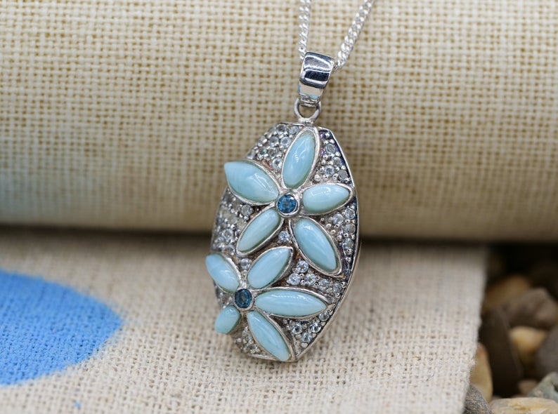 Exquisite Caribbean Larimar Pendant Necklace with Handcrafted Frangipani Flower - Unique One-of-a-Kind Jewelry for Beach Weddings & Boho Fashion
