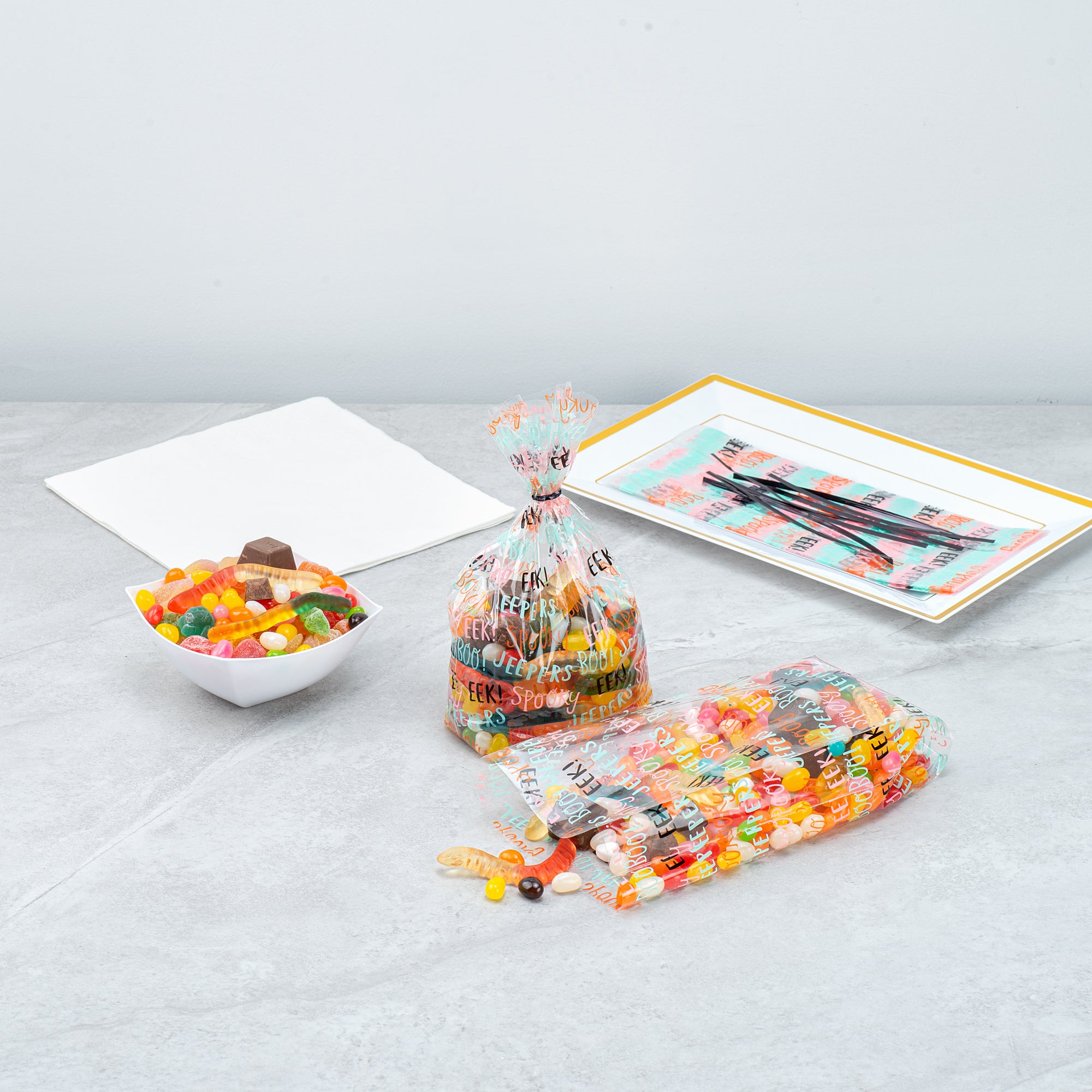 Halloween Plastic Candy Bags with Words - 4 x 2 x 9.5 Inch Gusseted Treat Bags (4000 Count Bulk Box) - Perfect for Trick-or-Treat, Party Favors & Candy Packaging