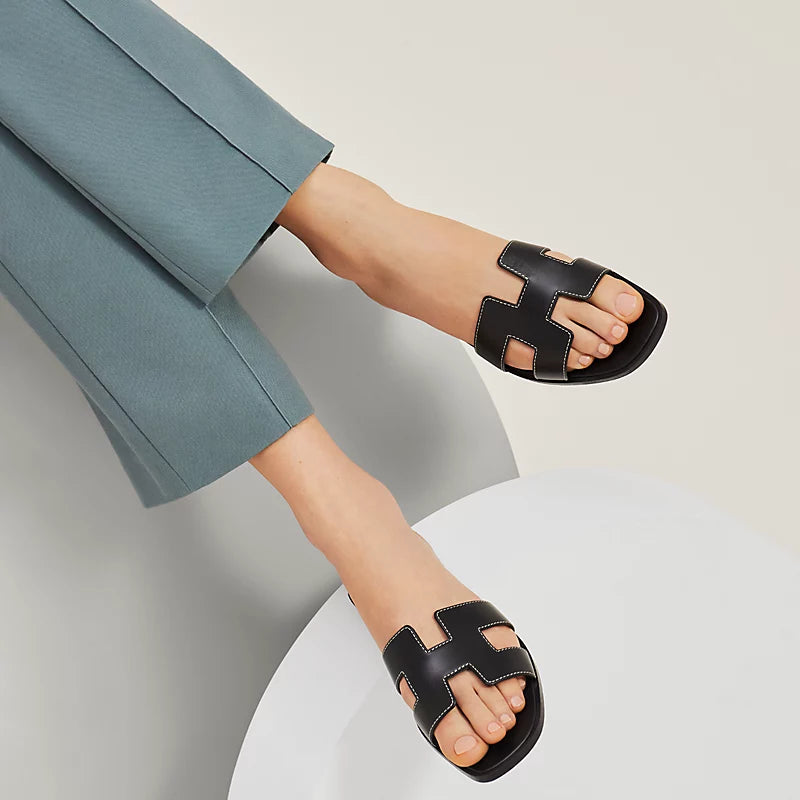 HERMES ORAN SANDALS in Noir - Luxury Leather Slide Sandals for Women | Perfect for Summer, Beach, and Casual Outings