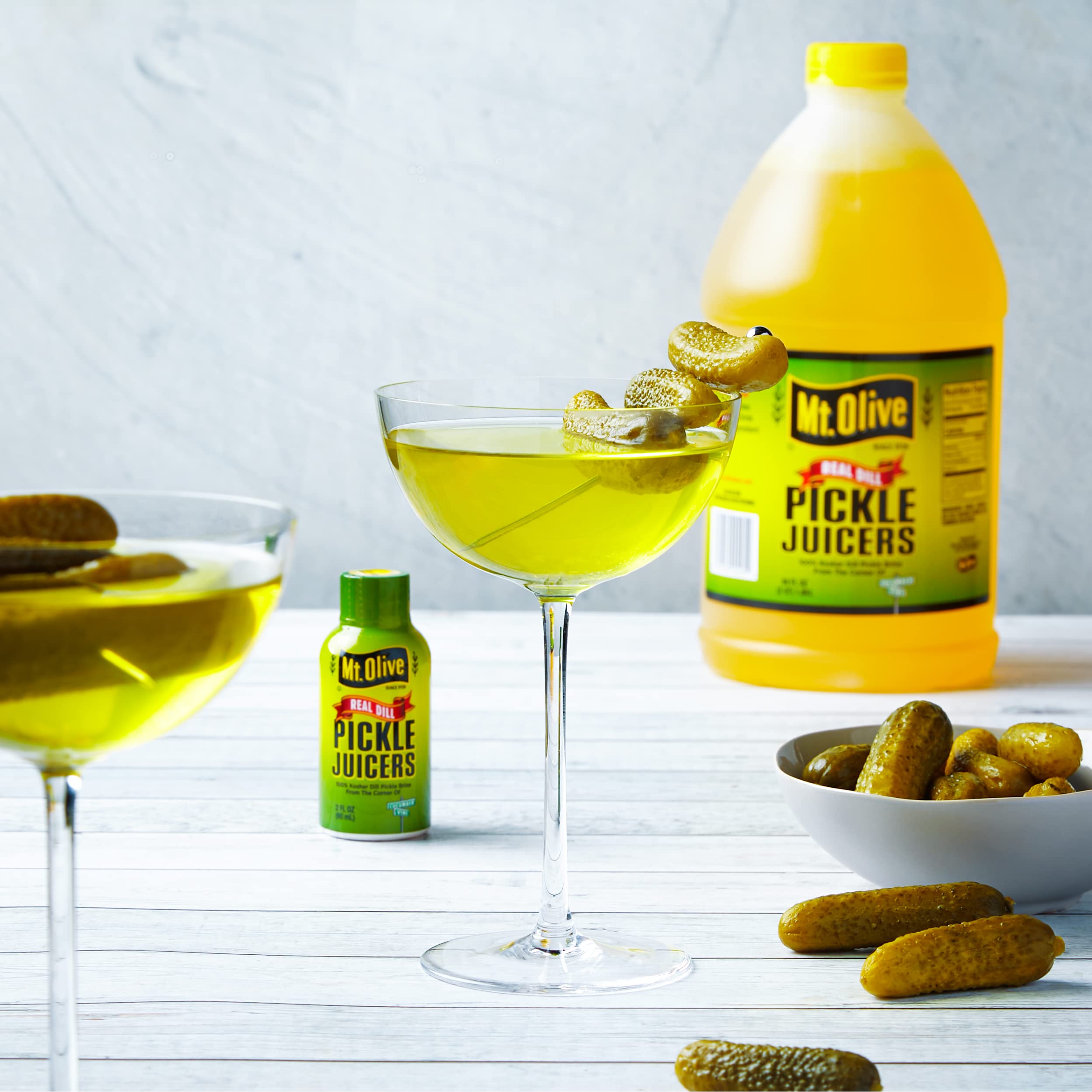 Mt. Olive Pickle Juice 100% Kosher Dill Pickle Brine - 12 Pack of 2 fl oz Bottles | Hydration & Recovery Drink for Athletes, Cocktail Mixer, Cooking Ingredient