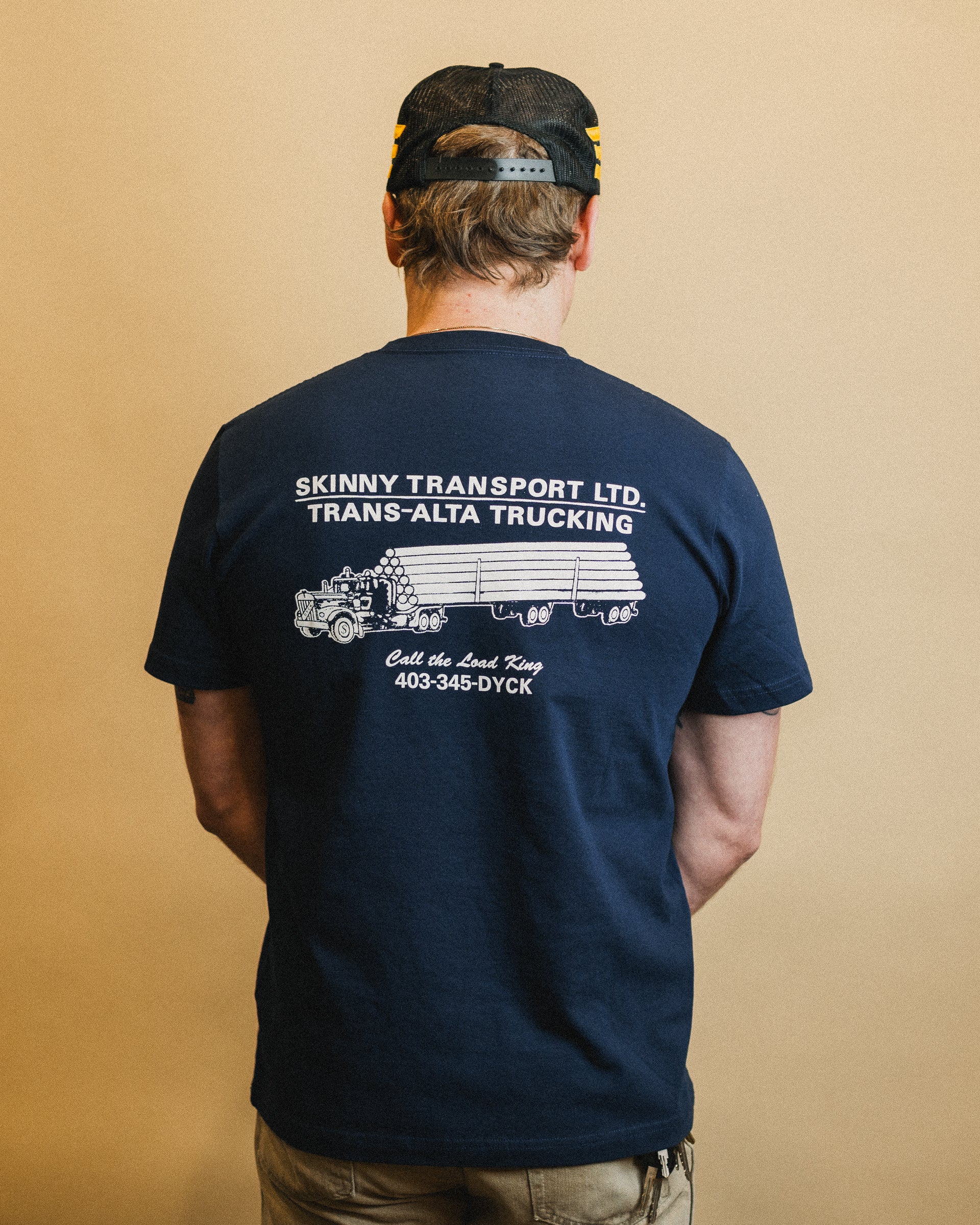 Skinny Dyck Transport Graphic T-Shirt - Navy Blue Cotton Tee for Men & Women | Casual Wear, Street Style, Everyday Outfits