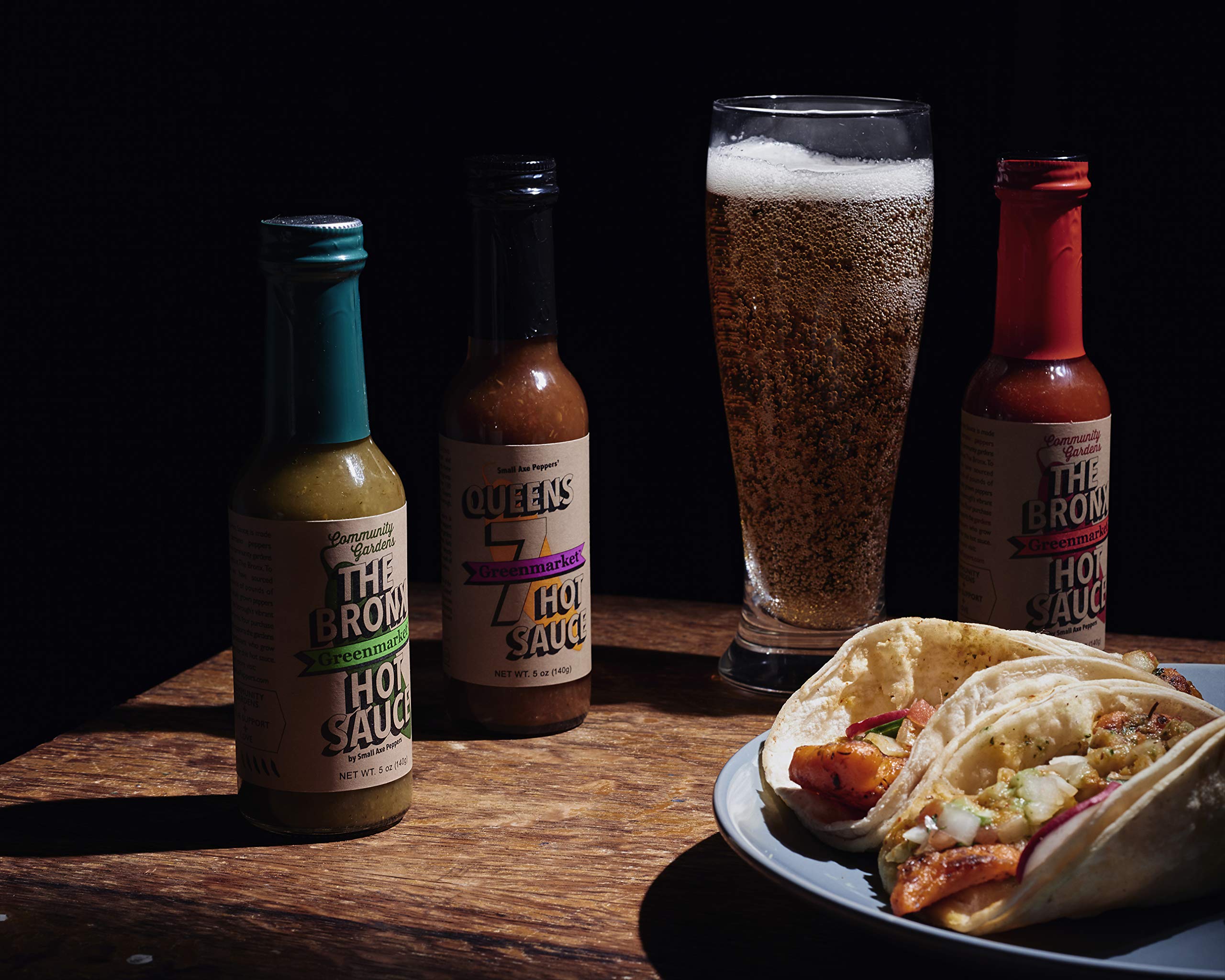 Small Axe Peppers NYC Hot Sauce Set - 3 Pack (5 oz Each) | All Natural, Non-GMO, Community Garden Grown | Gourmet Hot Sauce with Queens 7, Bronx Red & Bronx Greenmarket Serrano Pepper | Featured on HOT ONES | Perfect for Wings, Tacos, Burgers & Gifting