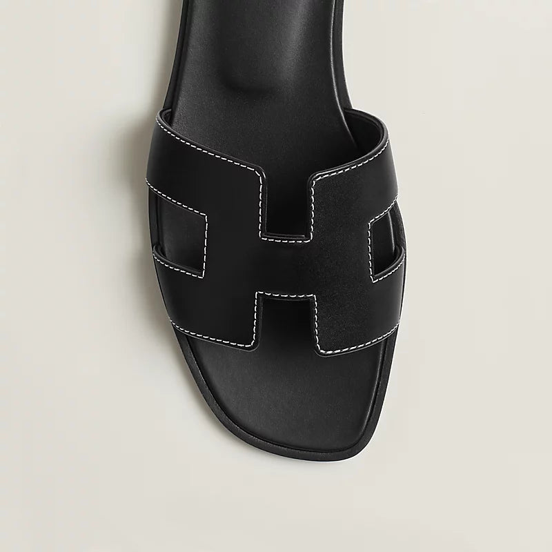 HERMES ORAN SANDALS in Noir - Luxury Leather Slide Sandals for Women | Perfect for Summer, Beach, and Casual Outings