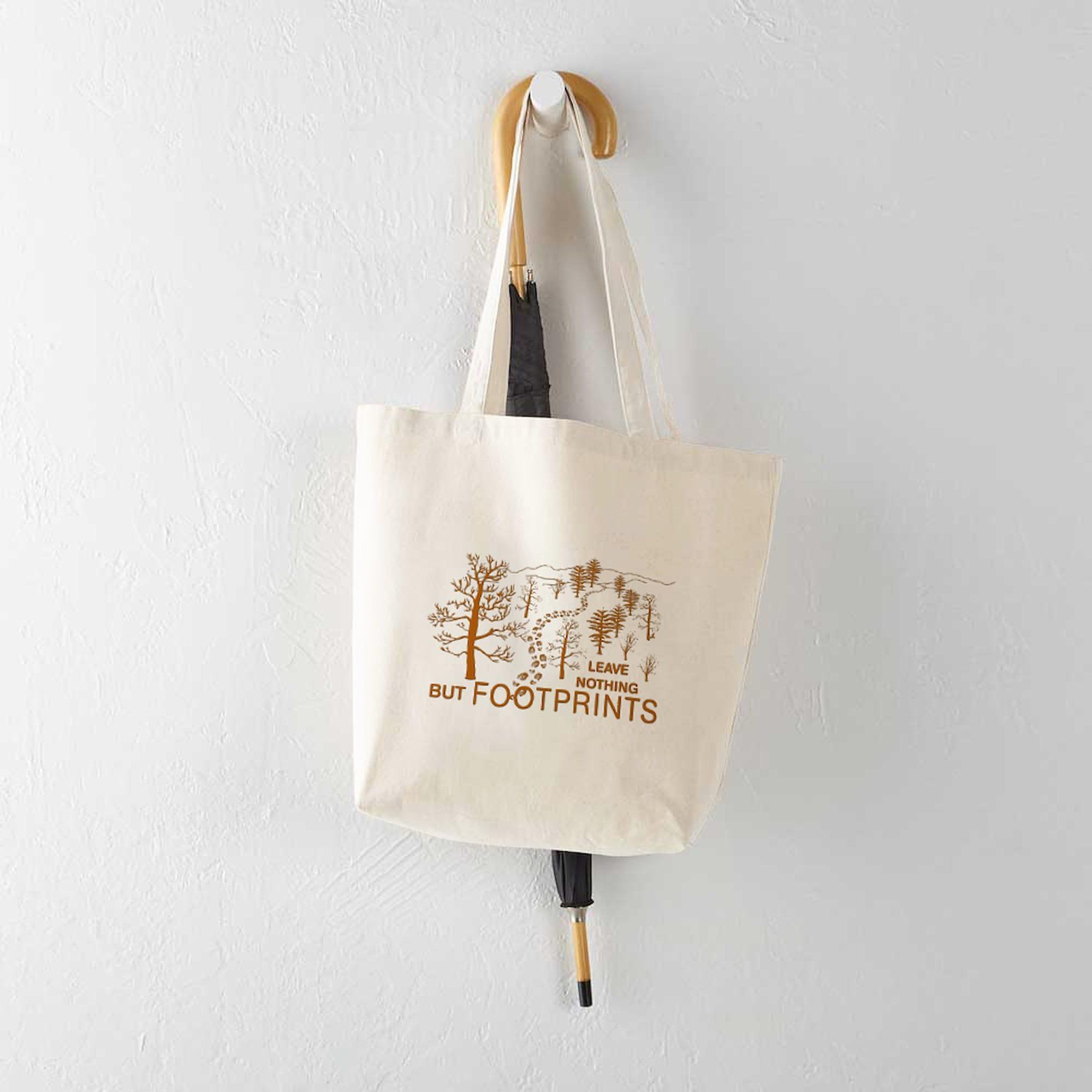 Eco-Friendly Brown Canvas Tote Bag - Reusable Natural Shopping Bag with 'Leave Nothing But Footprints' Print | Perfect for Groceries, Beach Trips & Sustainable Lifestyle