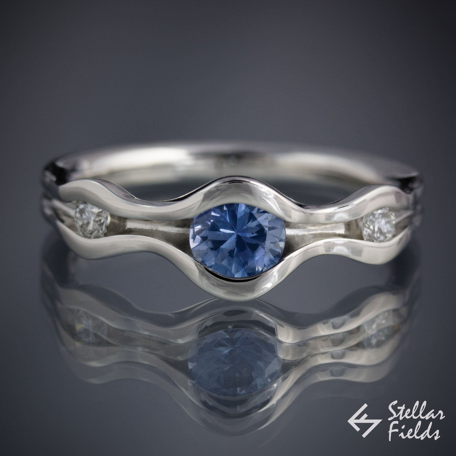 Exquisite Three Stone Wave Engagement Ring with Blue Montana Sapphire & Canadian Arctic Diamonds - Perfect for Proposals, Anniversaries & Romantic Occasions