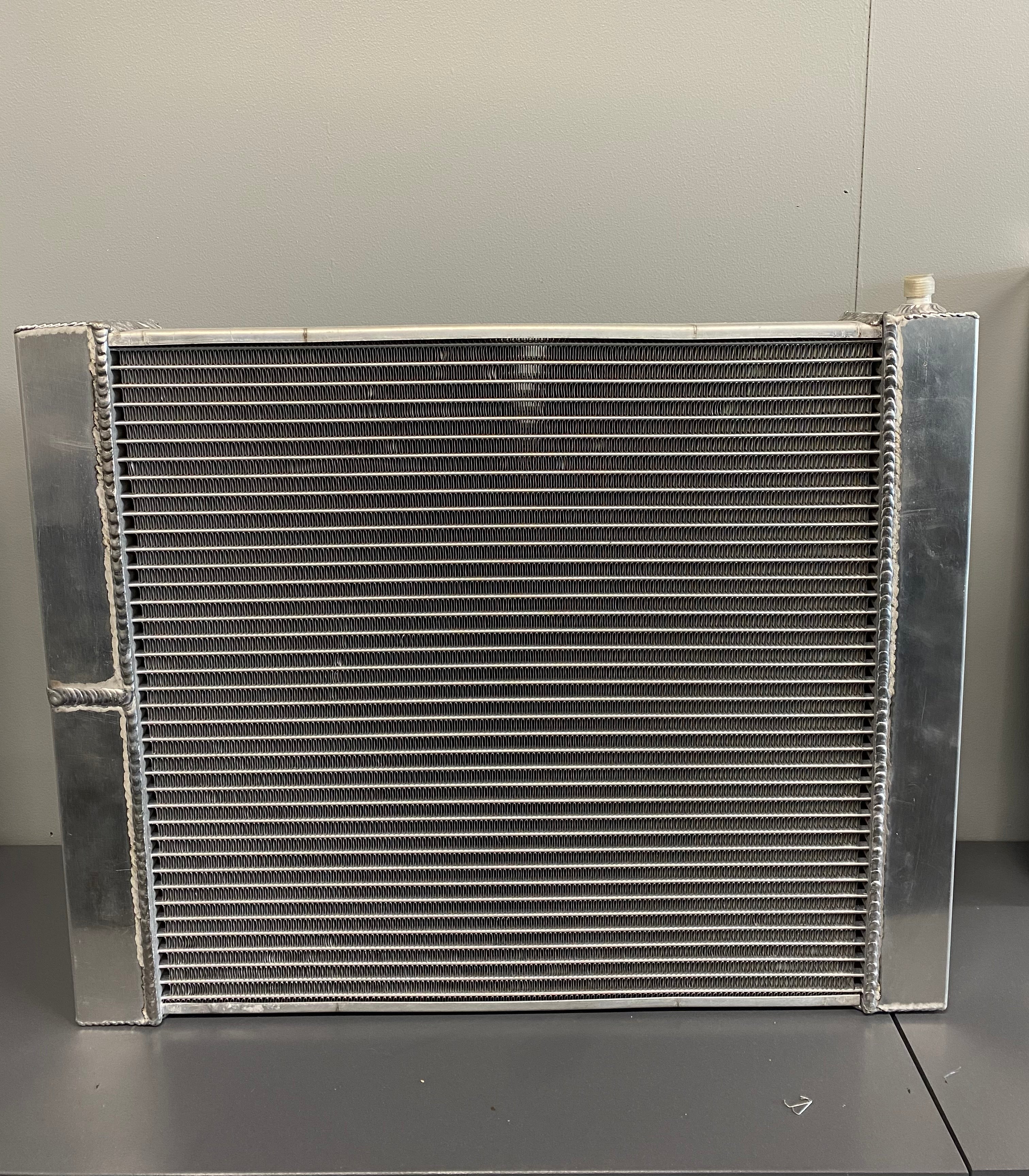 Universal Radiator with Left or Right Hand Outlets - Compatible with Most Vehicles for Home and Auto Repair
