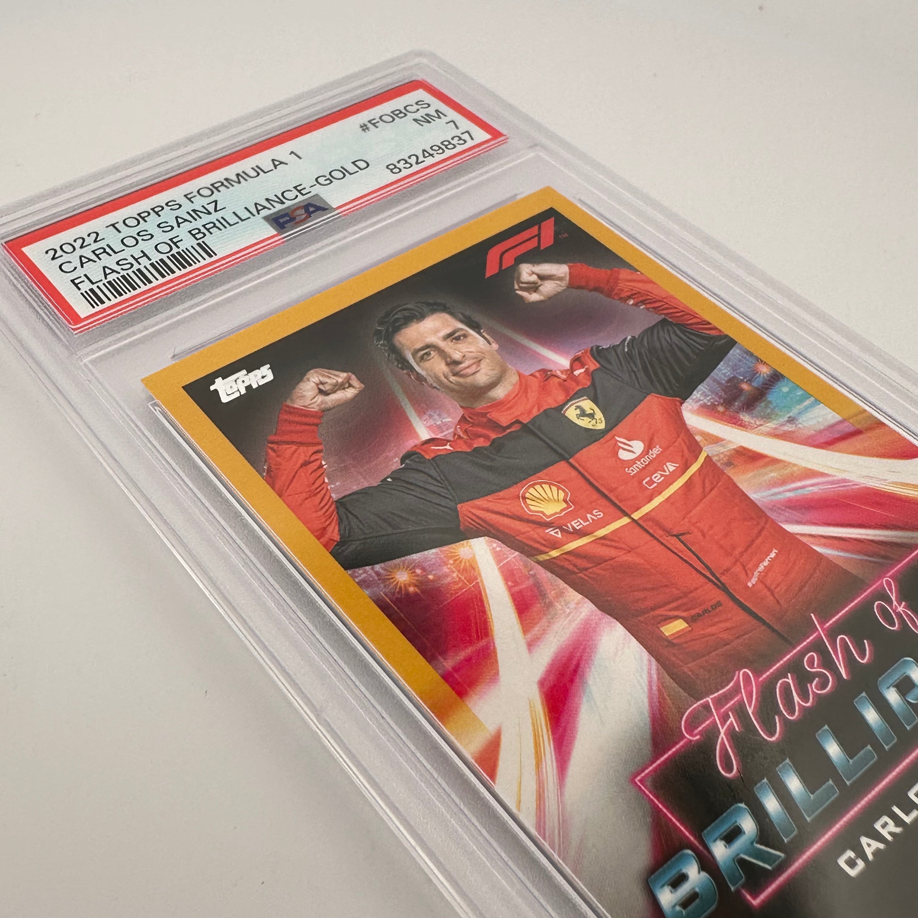PSA 7 Carlos Sainz #FOBCS Flash Of Brilliance Gold Trading Card - 19/50 Limited Edition - Perfect for F1 Collectors and Racing Memorabilia Displays