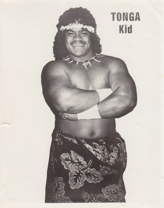 Vintage 1980s WWWF Tonga Kid Wrestling Promo Photo - Rare Collectible Memorabilia for Wrestling Fans and Nostalgia Enthusiasts | Perfect for Home Decor, Man Cave, or Wrestling Memorabilia Collections