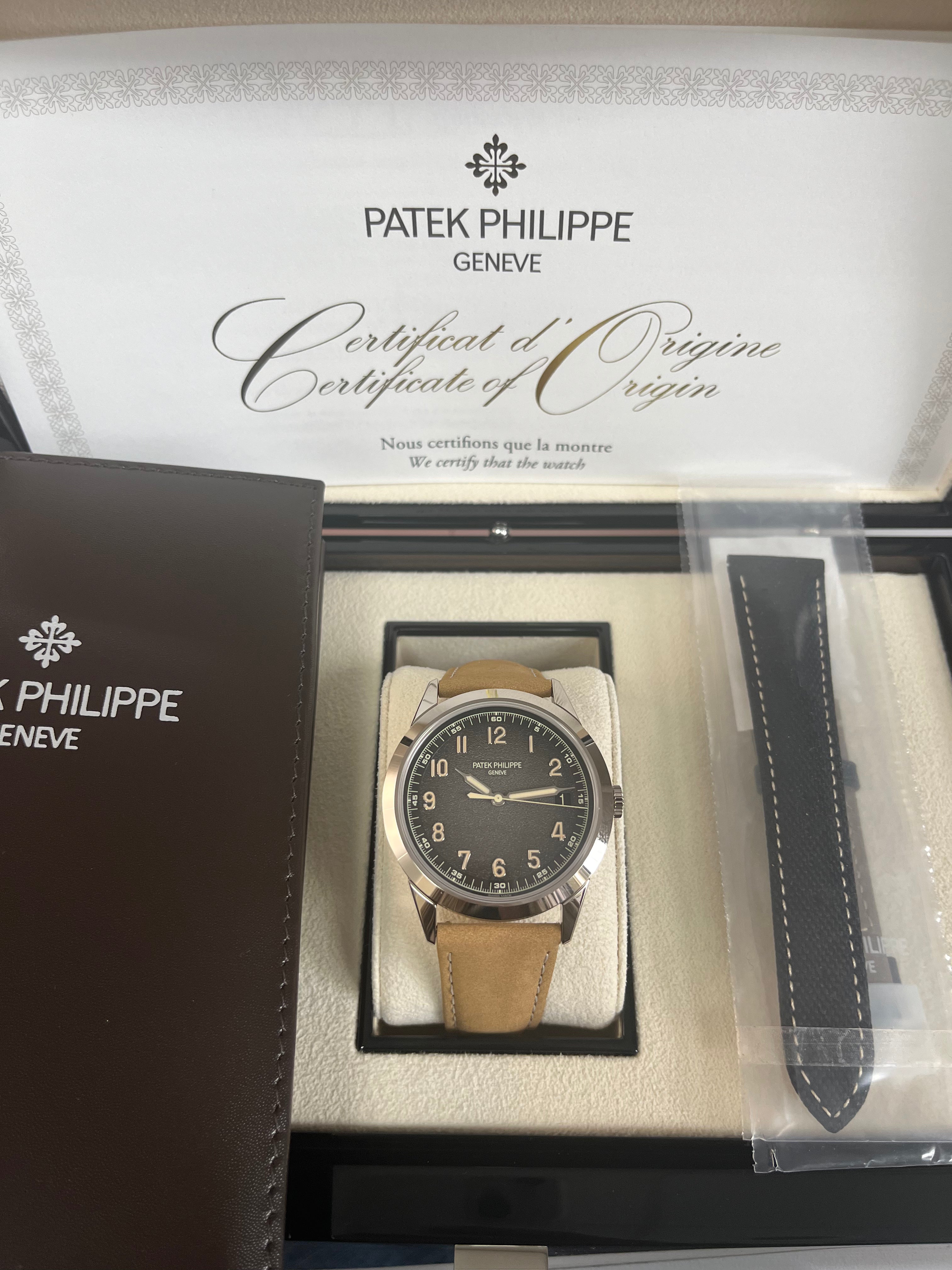 Patek Philippe Calatrava 5226G-001 40mm Men's Luxury Watch - 18K White Gold Case with Textured Dial - Perfect for Business Meetings & Formal Occasions