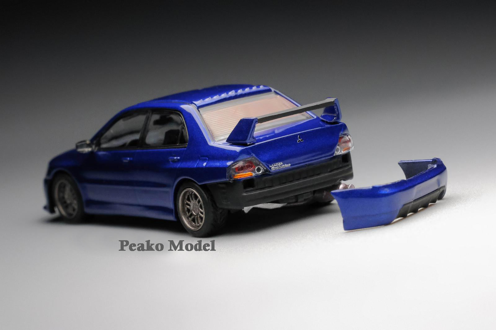 Mitsubishi Lancer EVO IX Blue Sports Car - High Performance Turbocharged Sedan for Racing & Street Driving | Perfect for Car Enthusiasts & Track Days