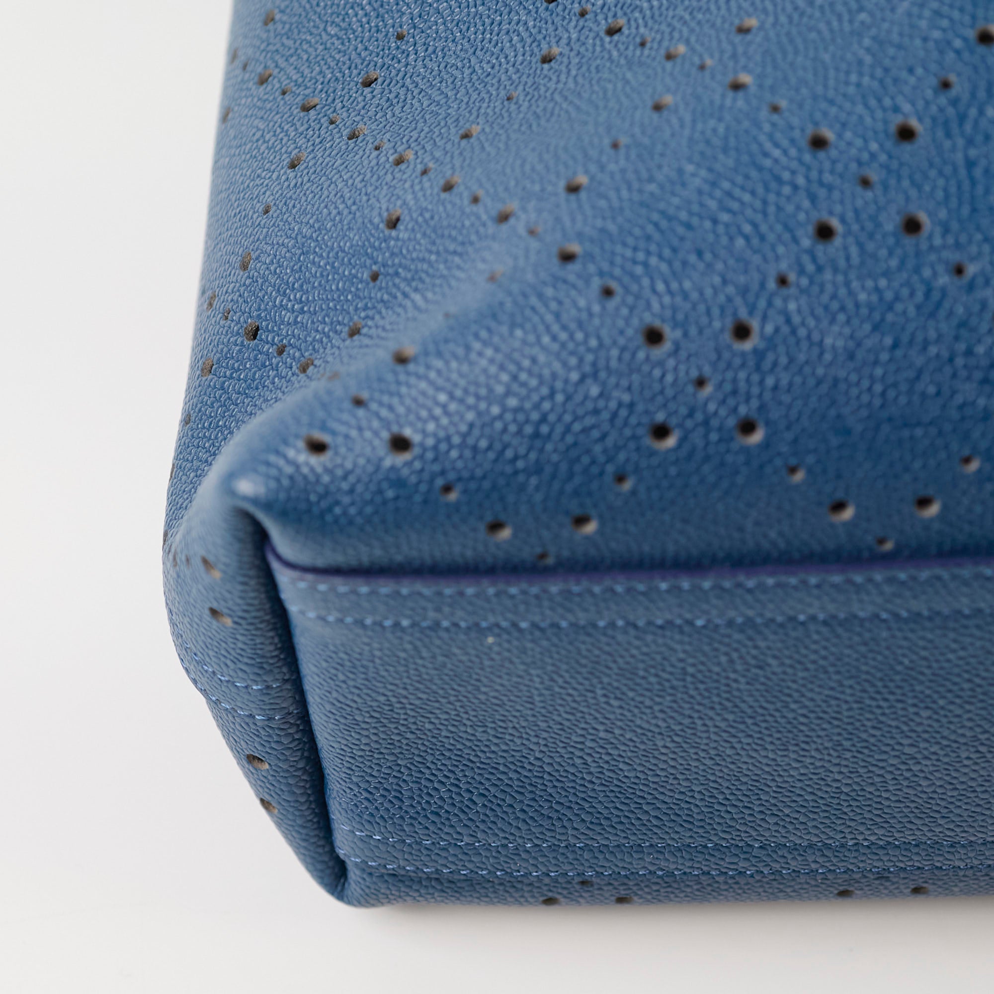 Chanel Perforated Drawstring Bucket Bag in Blue | Luxury Designer Handbag for Women | Perfect for Casual Outings & Beach Vacations