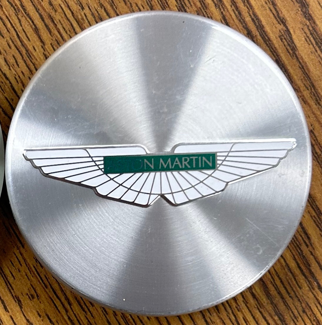 140mm Aston Martin DB9 Volante OEM Brushed Silver Wheel Center Caps (Set of 4) - Genuine #6G331A096AA - Perfect for Luxury Car Restoration & Customization