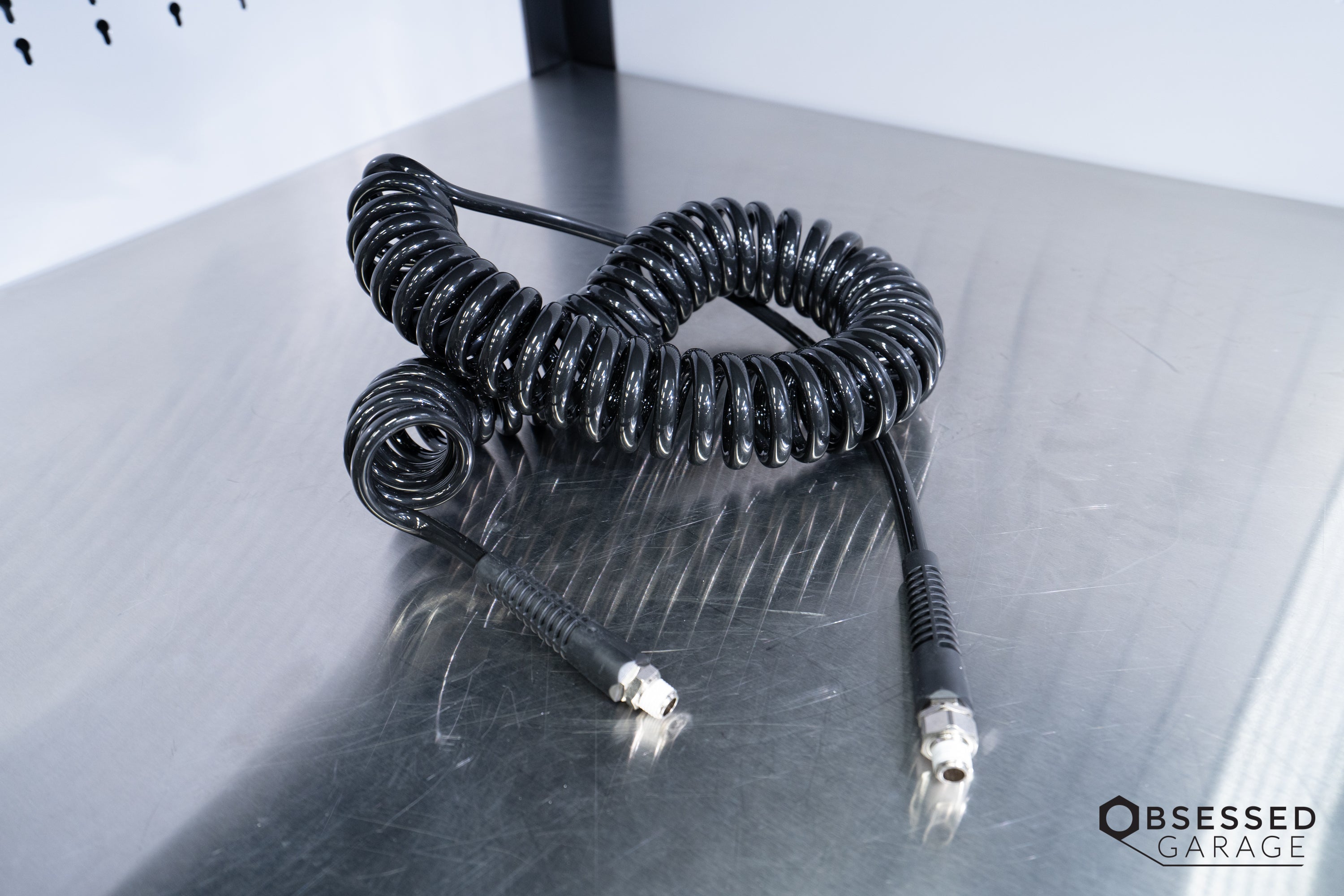 Prevost Spiral Hose with Fixed & Rotating 1/4