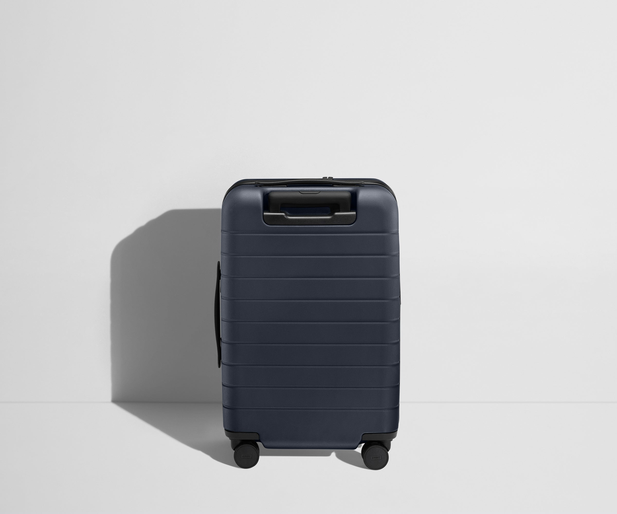 The Carry On Flex in Navy Blue - Lightweight Expandable Luggage for Travel - Perfect for Airplane, Business Trips & Weekend Getaways