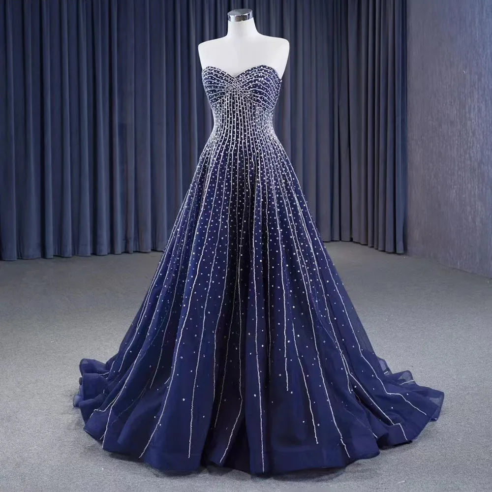 Serene Hill Navy Blue Luxury Strapless Crystal Beaded Wedding Dress with Pearls & Lace Up Detail - Custom Made Bridal Gown HM23102 | Perfect for Beach Weddings, Evening Receptions & Formal Events