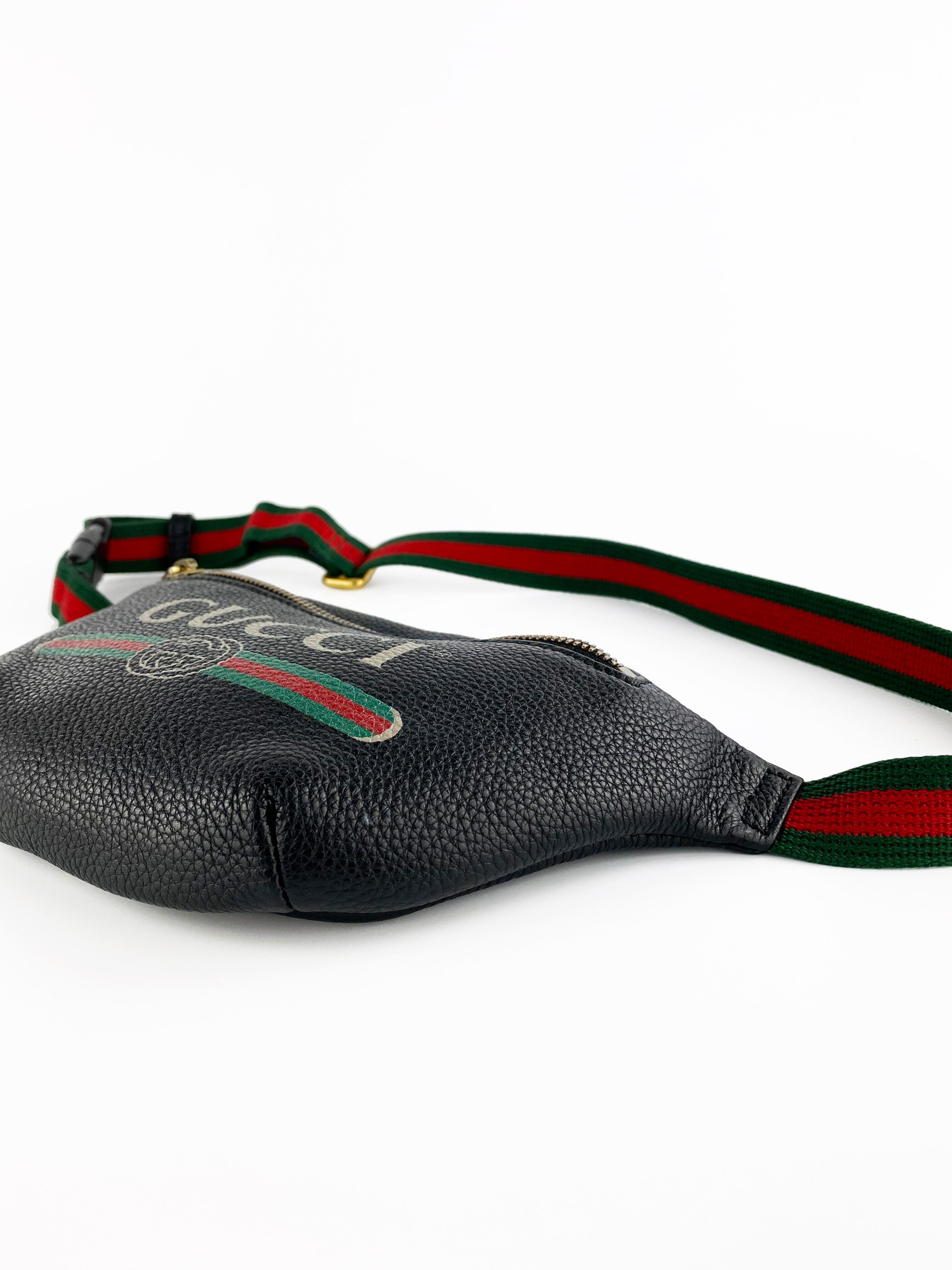 Gucci Black Leather Belt Bag with Signature Print - Stylish Waist Pack for Men & Women, Perfect for Travel, Concerts, and Everyday Fashion