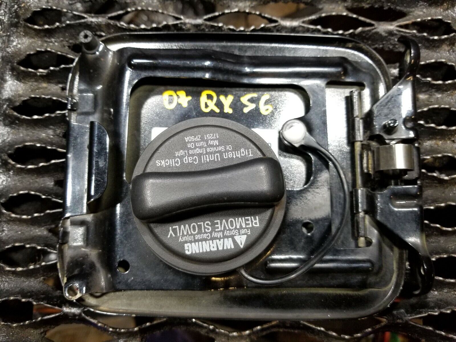 2004-2007 Infiniti QX56 OEM Fuel Tank Door Lid with Gas Cap Replacement - Perfect for Off-Roading & Daily Commutes