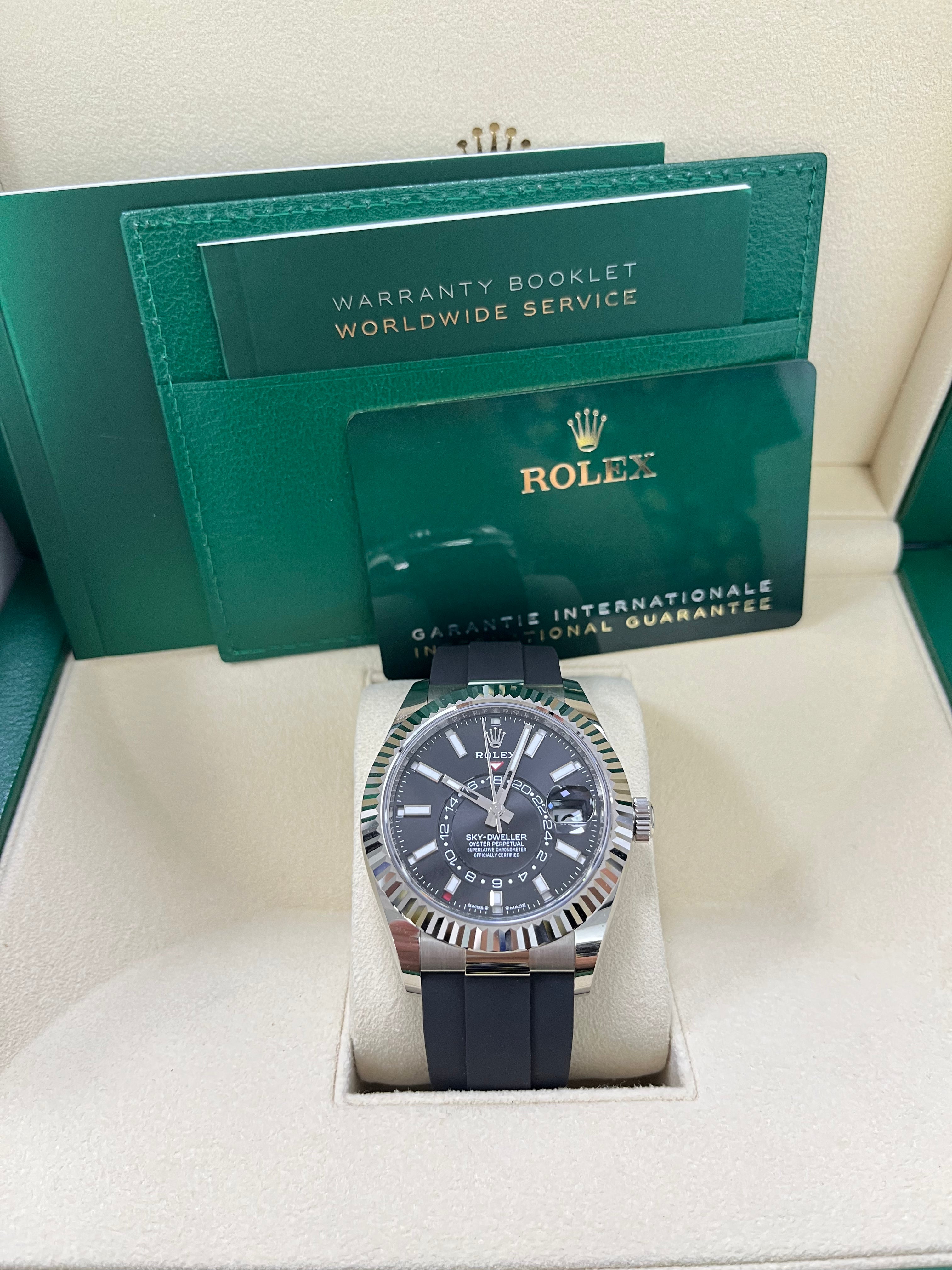 Rolex Sky-Dweller 42mm White Gold Watch with Fluted Bezel, Black Index Dial & Oysterflex Strap Ref. 336239 - Luxury GMT Master for Travel & Business Professionals