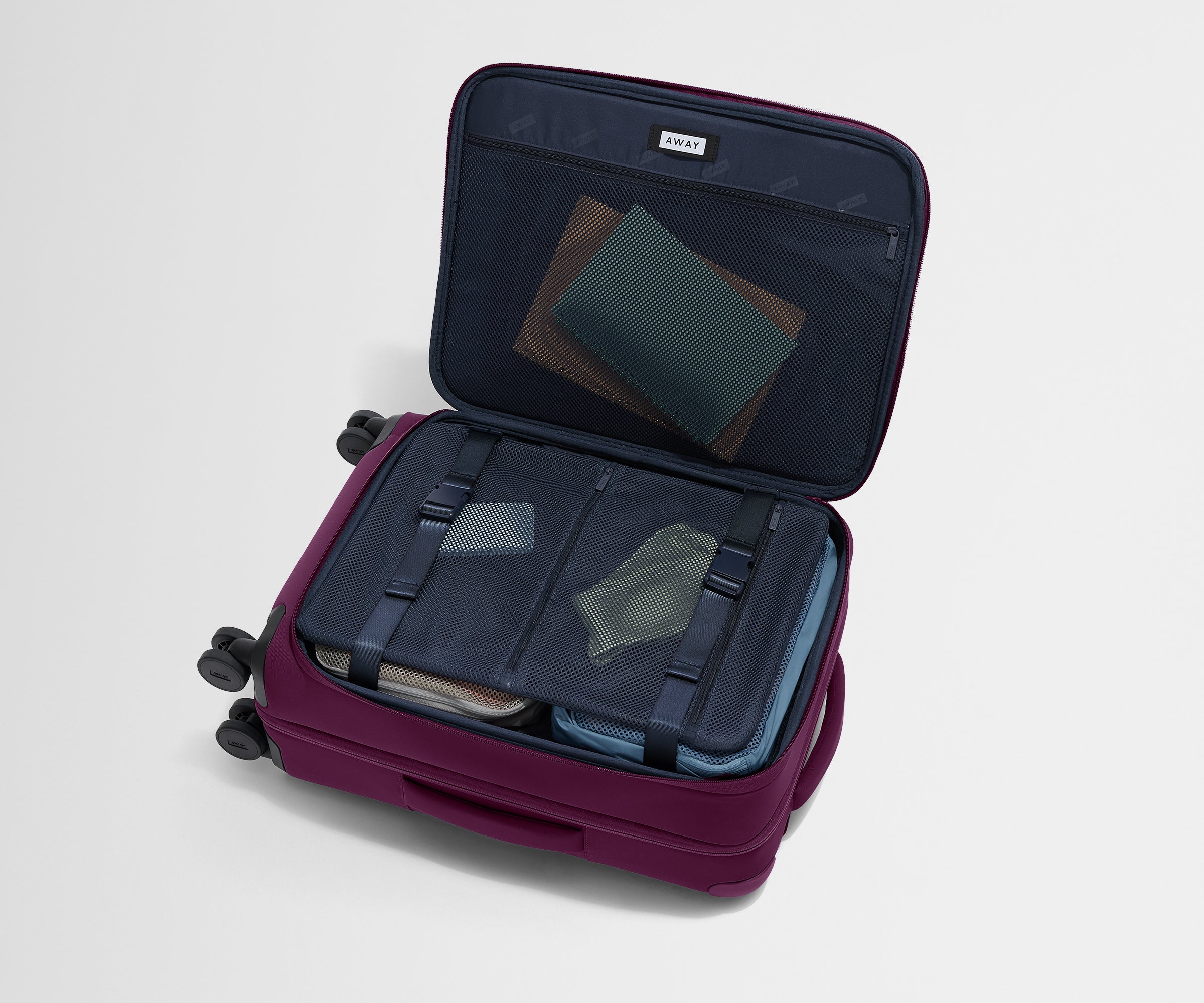 Softside Bigger Carry On Luggage in Plum Purple - Lightweight Expandable Suitcase for Air Travel & Weekend Getaways