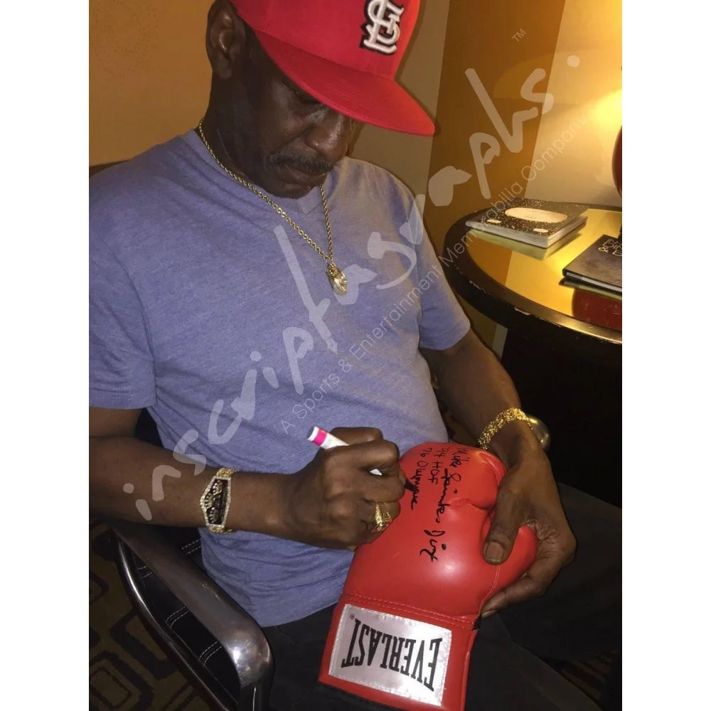 Michael Spinks Autographed Boxing Glove with COA - Signed by Leon - Collectible Memorabilia for Boxing Fans & Sports Enthusiasts - Perfect for Display in Man Cave, Sports Bar, or Gift for Boxing Lovers