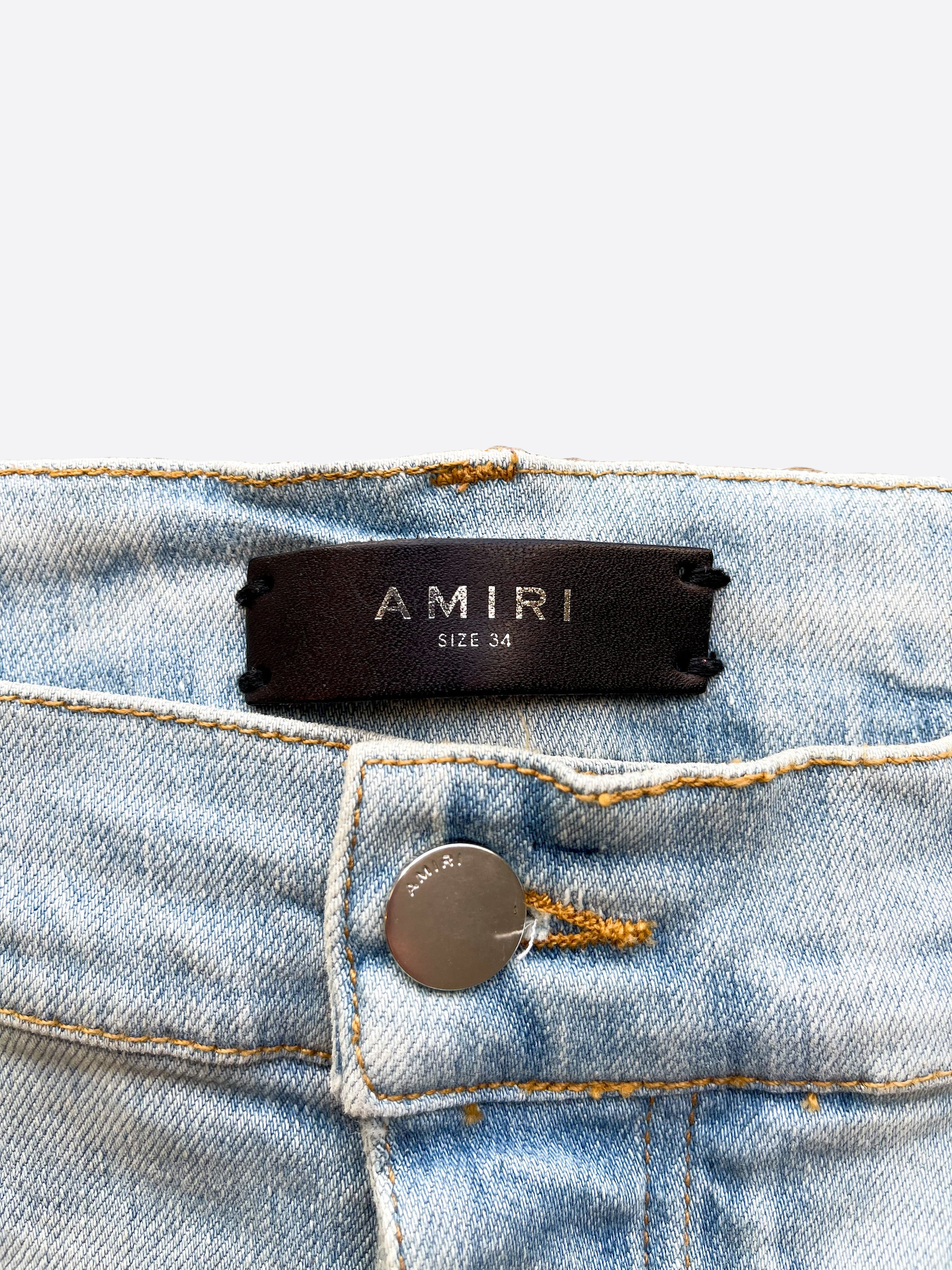 Amiri Distressed Bleach Splatter Denim Jeans for Men - Vintage Washed Slim Fit Ripped Designer Jeans - Perfect for Streetwear & Casual Outfits