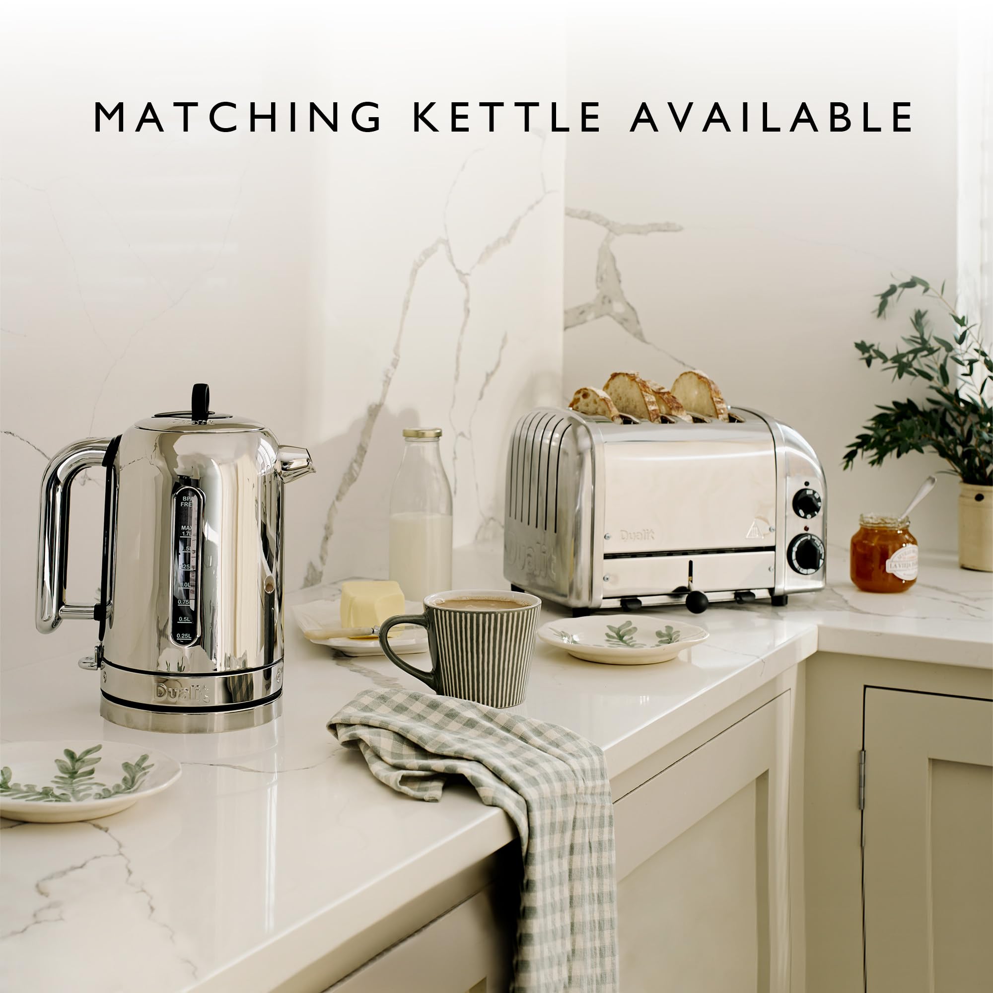 Dualit Classic 4-Slice NewGen Toaster - Stainless Steel, Handcrafted in UK - Replaceable ProHeat Elements - Defrost & Reheat Function - Mechanical Timer - Perfect for Breakfast, Brunch & Entertaining