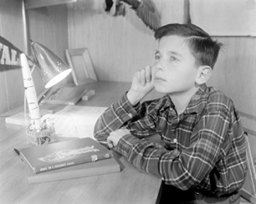 18 x 24 Boy Studying with Model Missile Poster - Vintage Space Theme Wall Art for Kids Room, Classroom & Office Decor