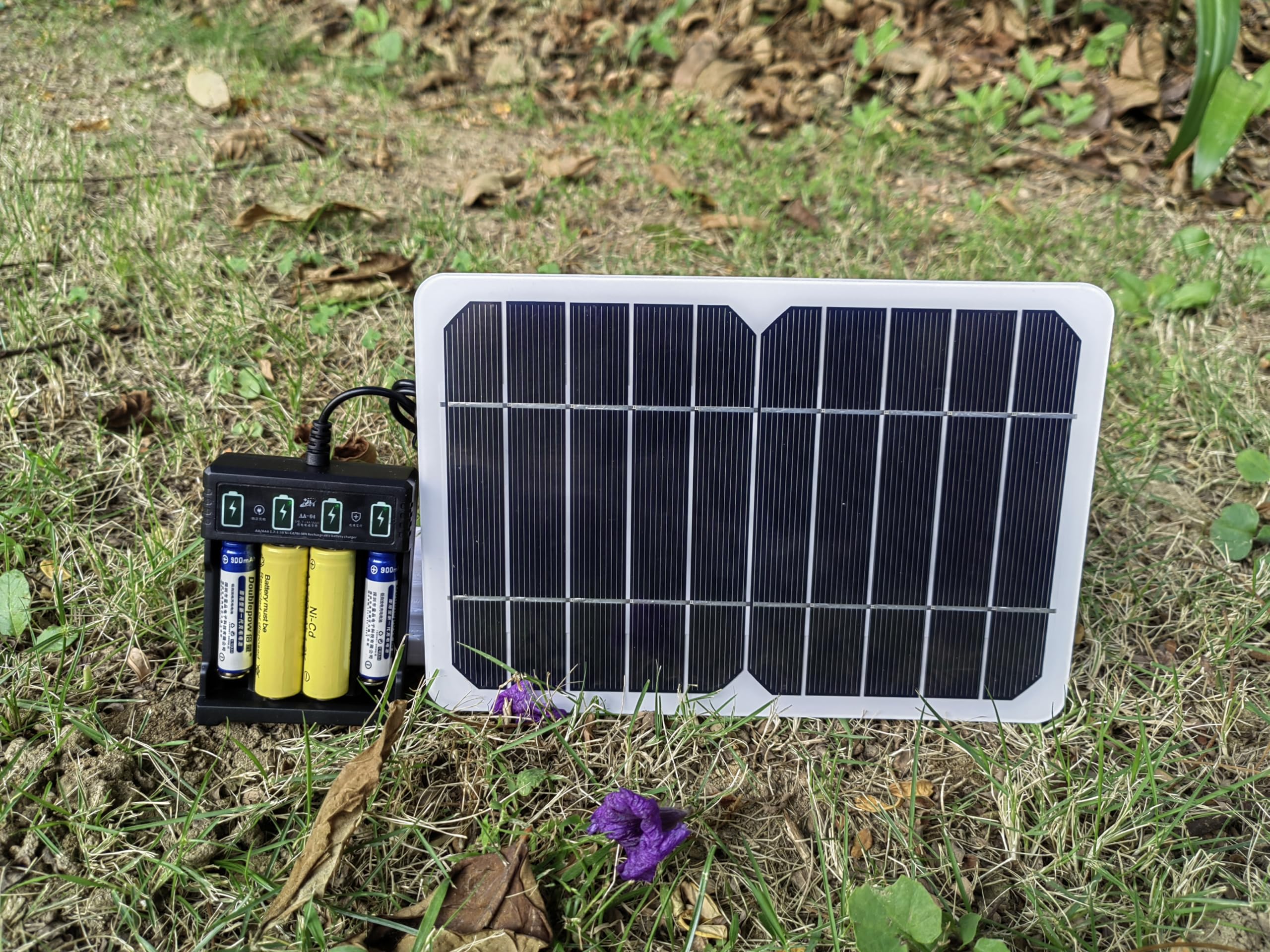 Portable 5W Solar Battery Charger for AA & AAA Ni-MH/Ni-CD Rechargeable Batteries with USB Output - Charge Phones & Devices Anywhere - Perfect for Camping, Hiking & Emergency Power Backup