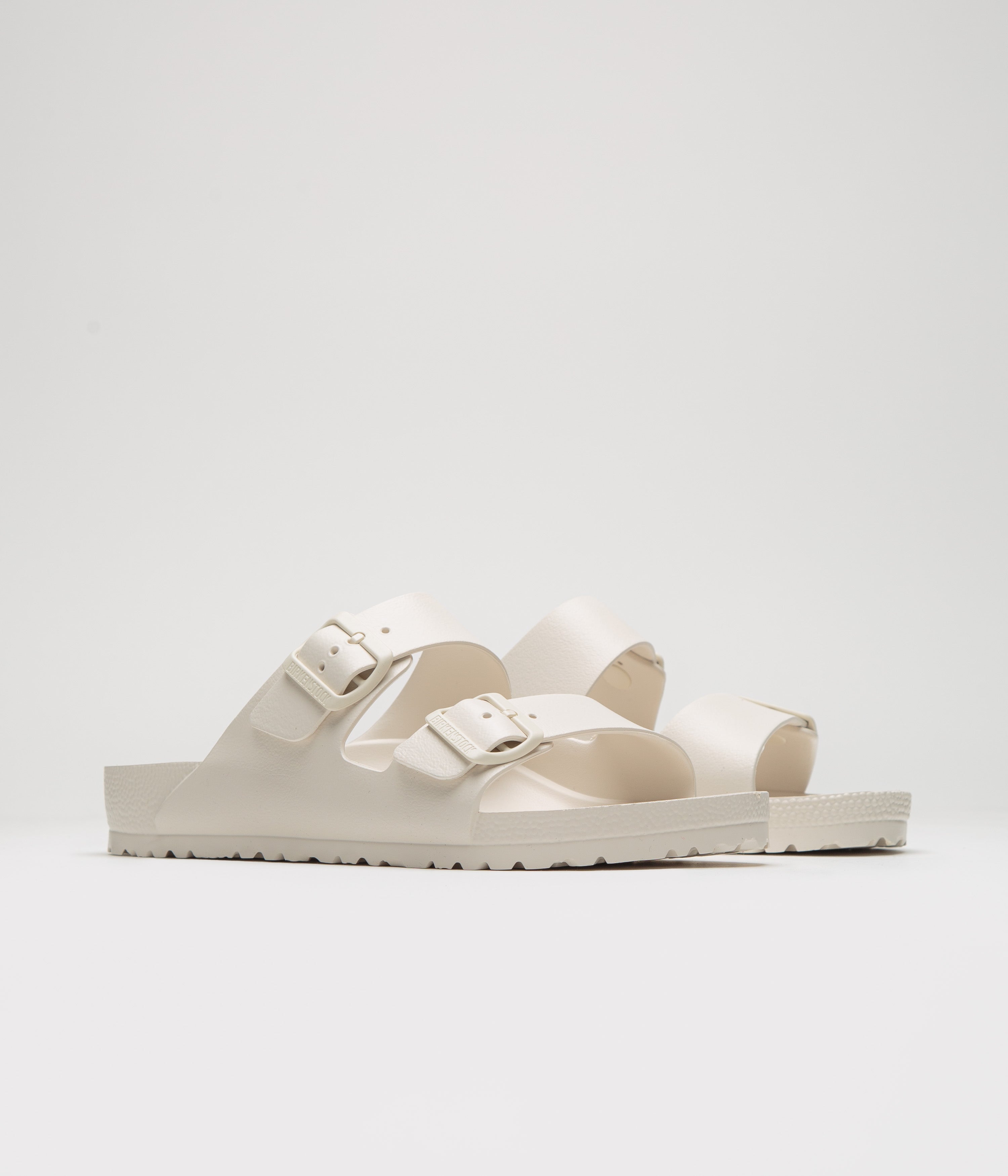 Birkenstock Arizona EVA Sandals for Women & Men - Lightweight Comfortable Slide Sandals in Eggshell White | Perfect for Beach, Pool, Travel & Summer Outdoor Activities