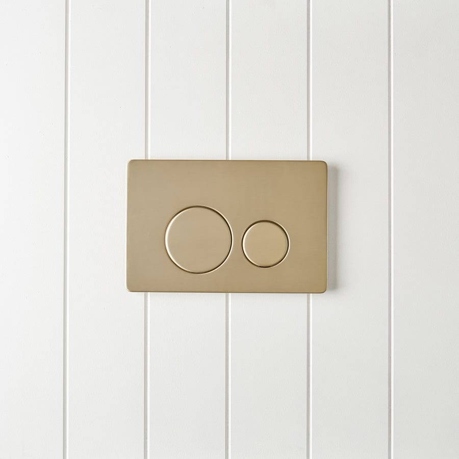 Curved In-Wall Toilet with Round Warm Brushed Nickel Buttons - Modern Space-Saving Bathroom Solution for Small Homes & Luxury Apartments