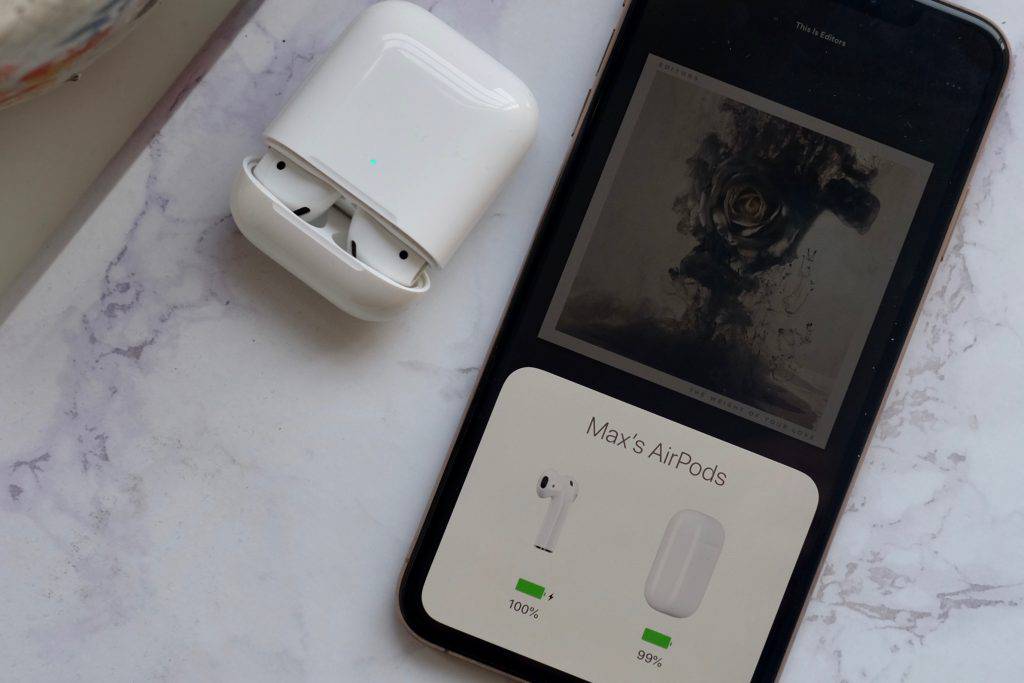 Apple AirPods (2nd Gen) with Wireless Charging Case - Bluetooth Earbuds for iPhone, iPad & Mac - Perfect for Workouts, Commuting & Hands-Free Calls