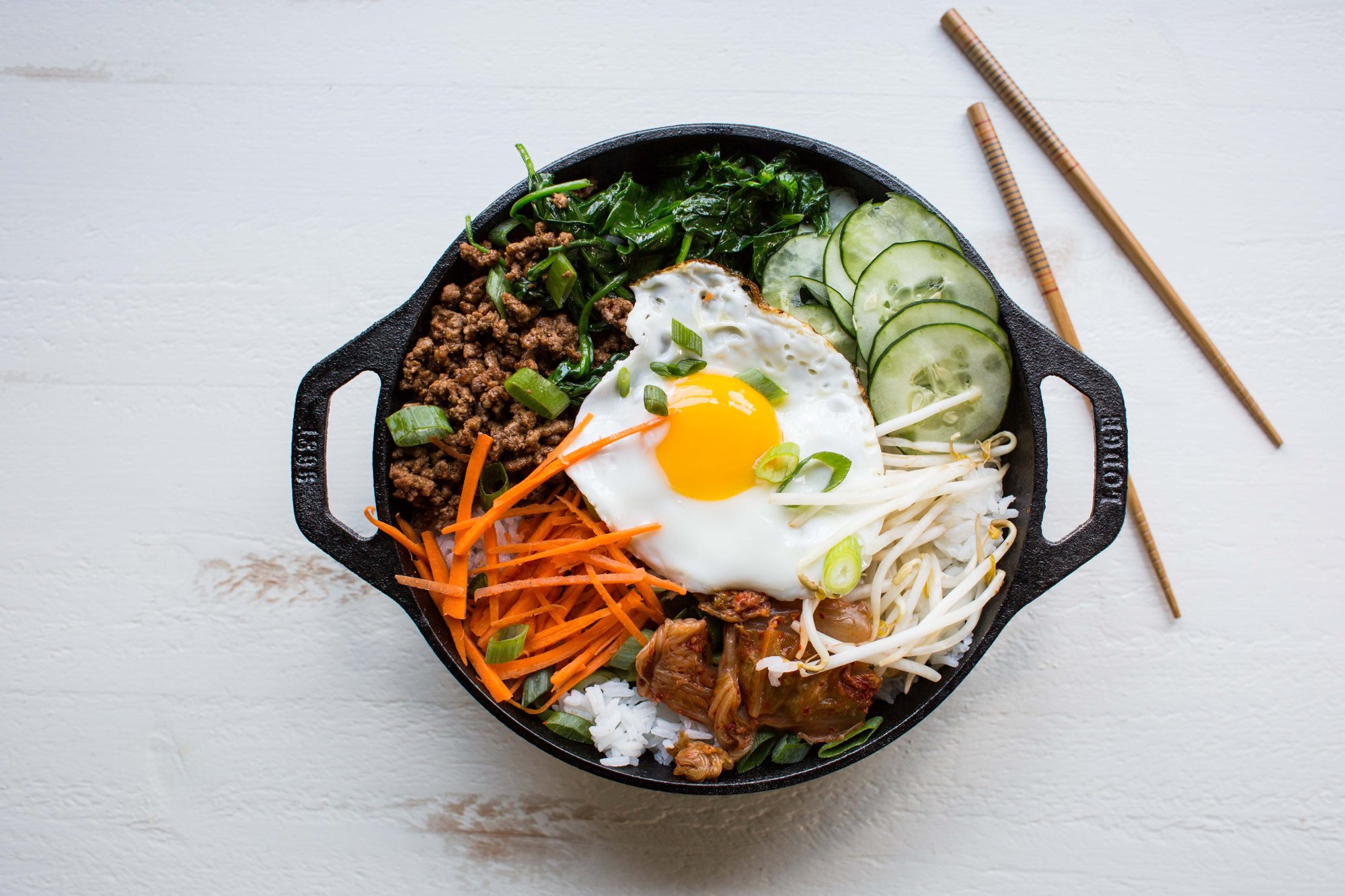 Lodge Cast Iron 9 Inch Mini Wok Set of 4 – Pre-Seasoned Skillet for Stir Fry, Sautéing & Asian Cooking – Perfect for Stovetop, Oven & Outdoor Camping Use
