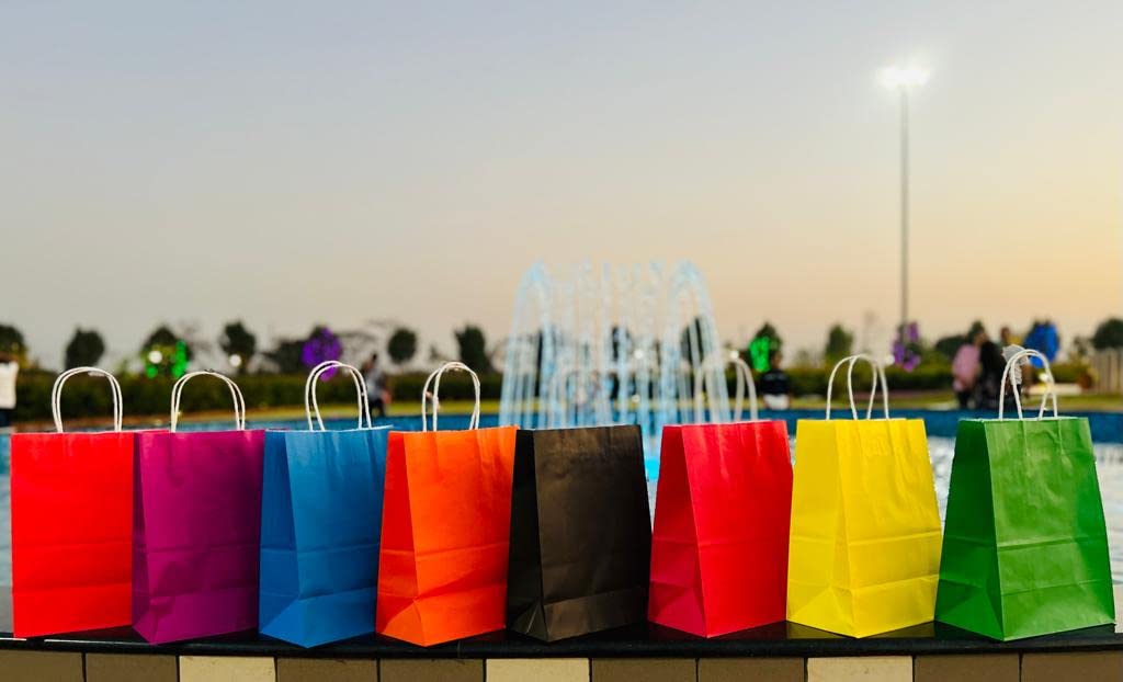 HOUSAI 28-Pack Kraft Paper Gift Bags - 7 Multi Colors for Party Favors, Wedding, Birthday & Holiday Gifting - Eco-Friendly Plain Paper Bags for Small Gifts, Treats & Goodie Bags