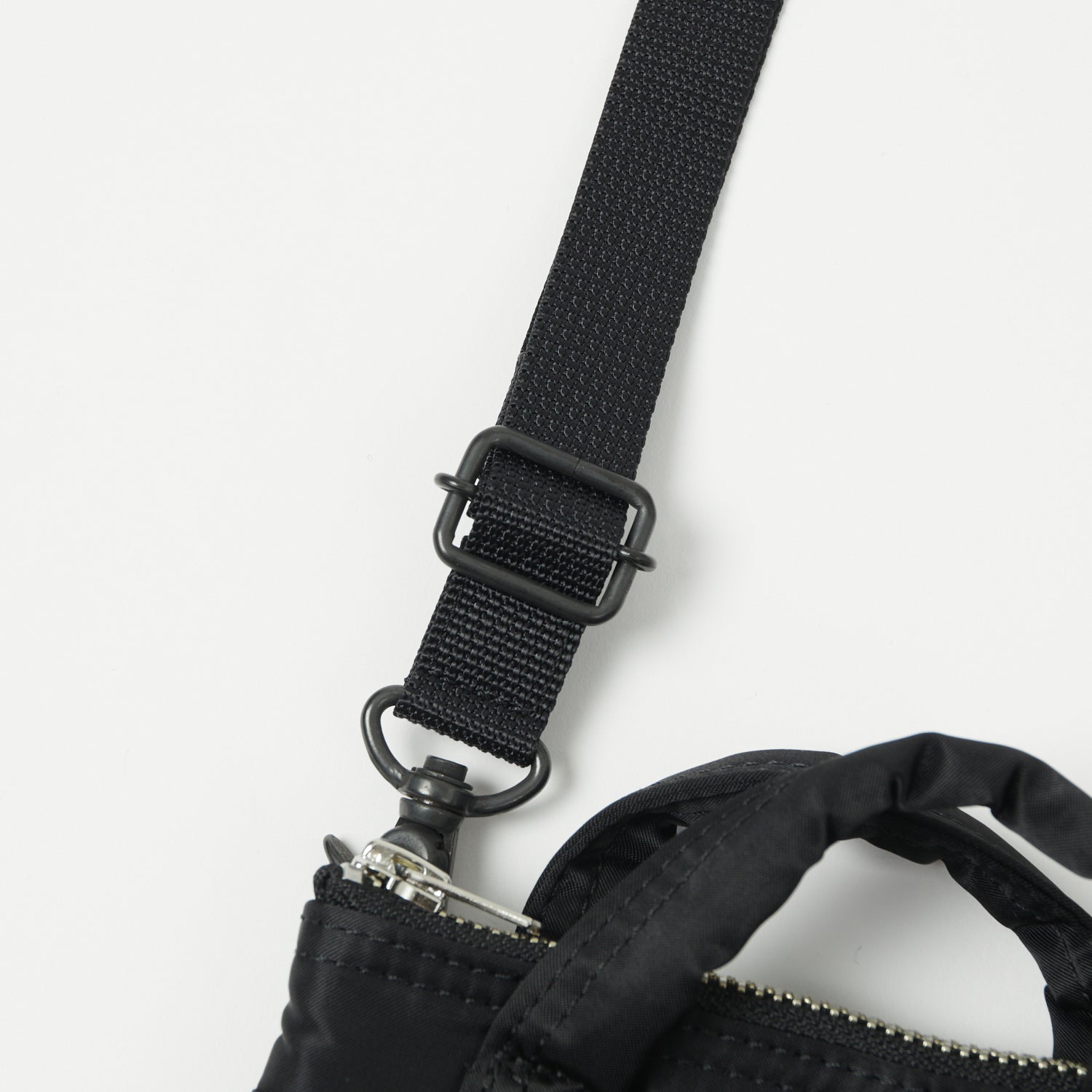 Porter Yoshida & Co. Howl Mini Helmet Bag - Stylish & Compact Unisex Crossbody Bag for Travel, Work & Daily Use | Durable Black Nylon Design