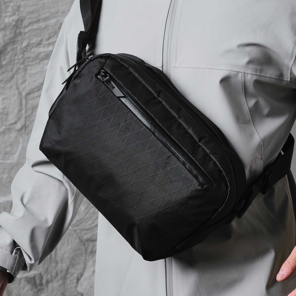 Go Sling Standard Black X Pac - Durable Crossbody Sling Bag for Men & Women - Perfect for Travel, Hiking, and Everyday Use
