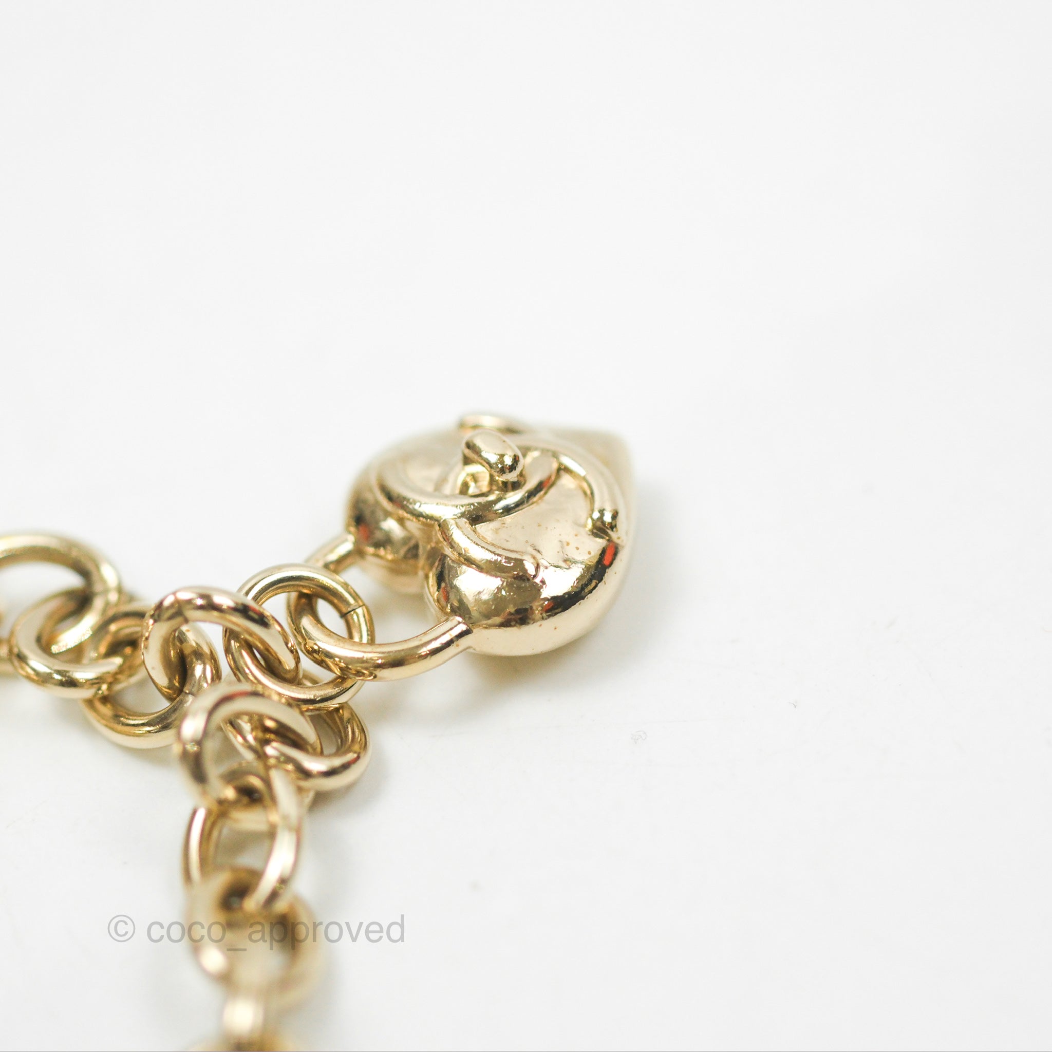 Chanel CC Heart Padlock Charms Chain Bracelet in Gold Tone - Elegant 22B Collection for Women | Perfect for Date Night, Parties & Special Occasions