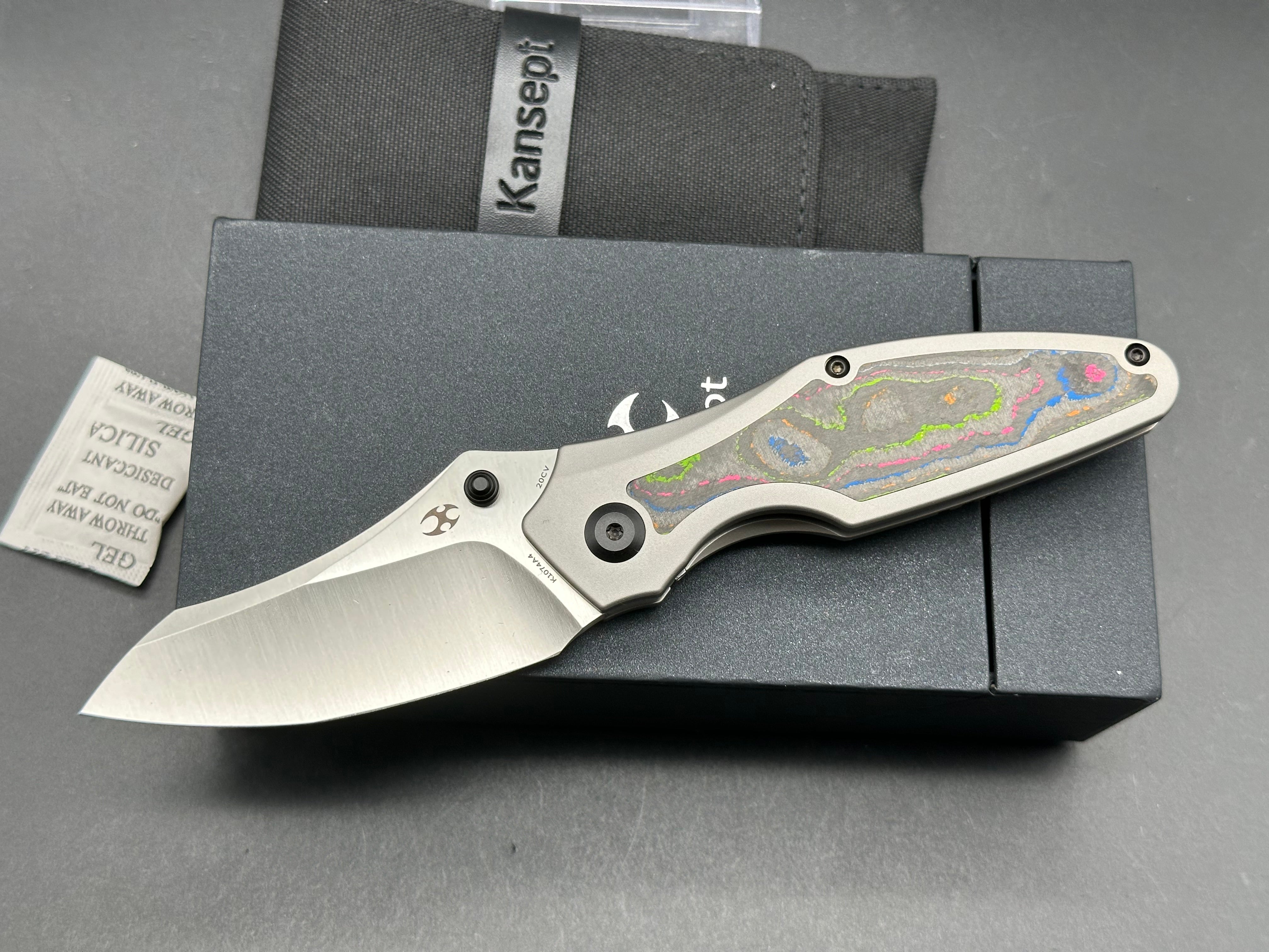 KANSEPT BABA YAGA Folding Pocket Knife - Titanium Handle with 80s Camo Carbon Fiber Inlay, 20CV Steel Plain Edge Blade - EDC, Camping, Outdoor Survival Gear