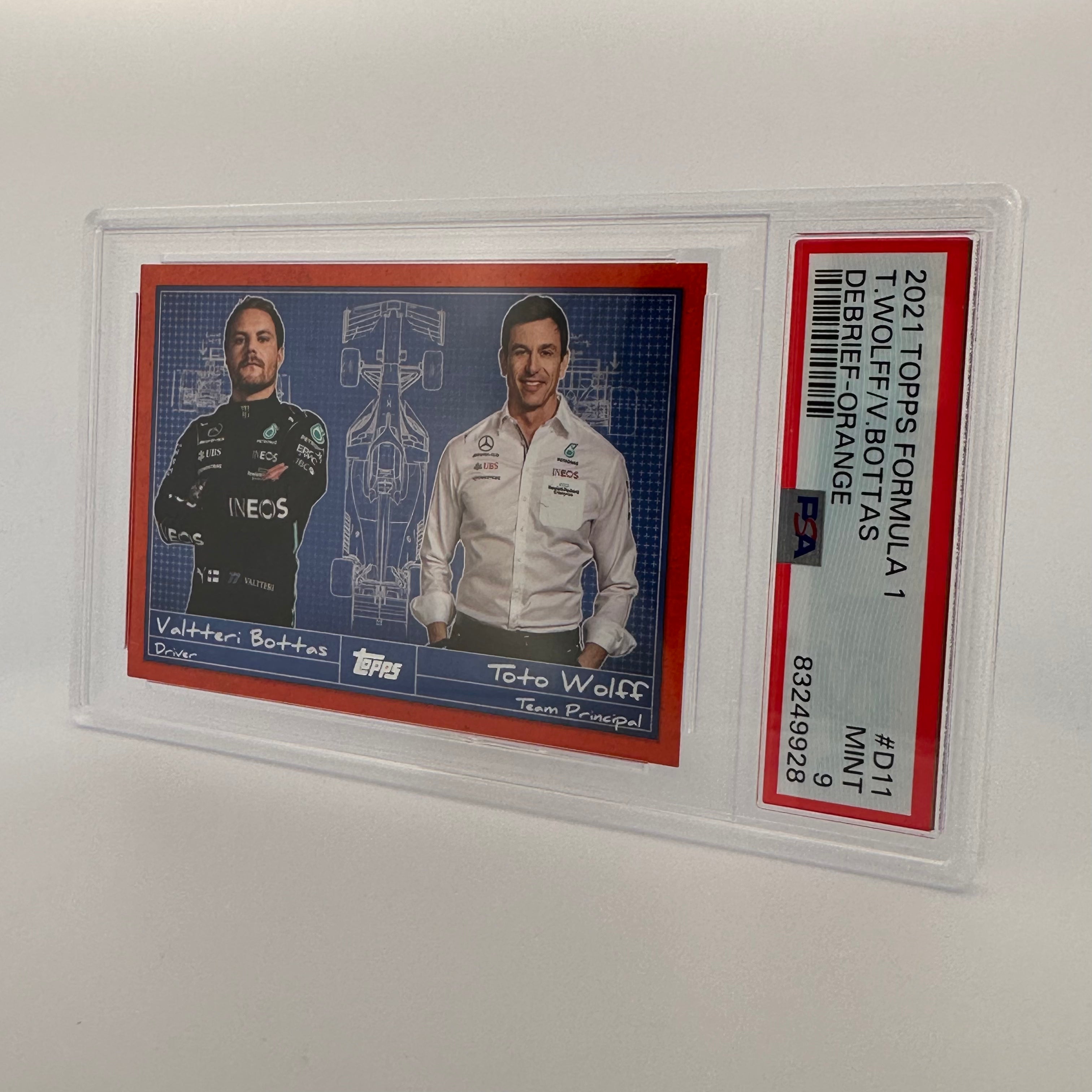 PSA 9 Graded 19/25 Valtteri Bottas & Toto Wolff Debrief #D11 Orange - Rare F1 Collectible for Motorsport Fans & Memorabilia Display